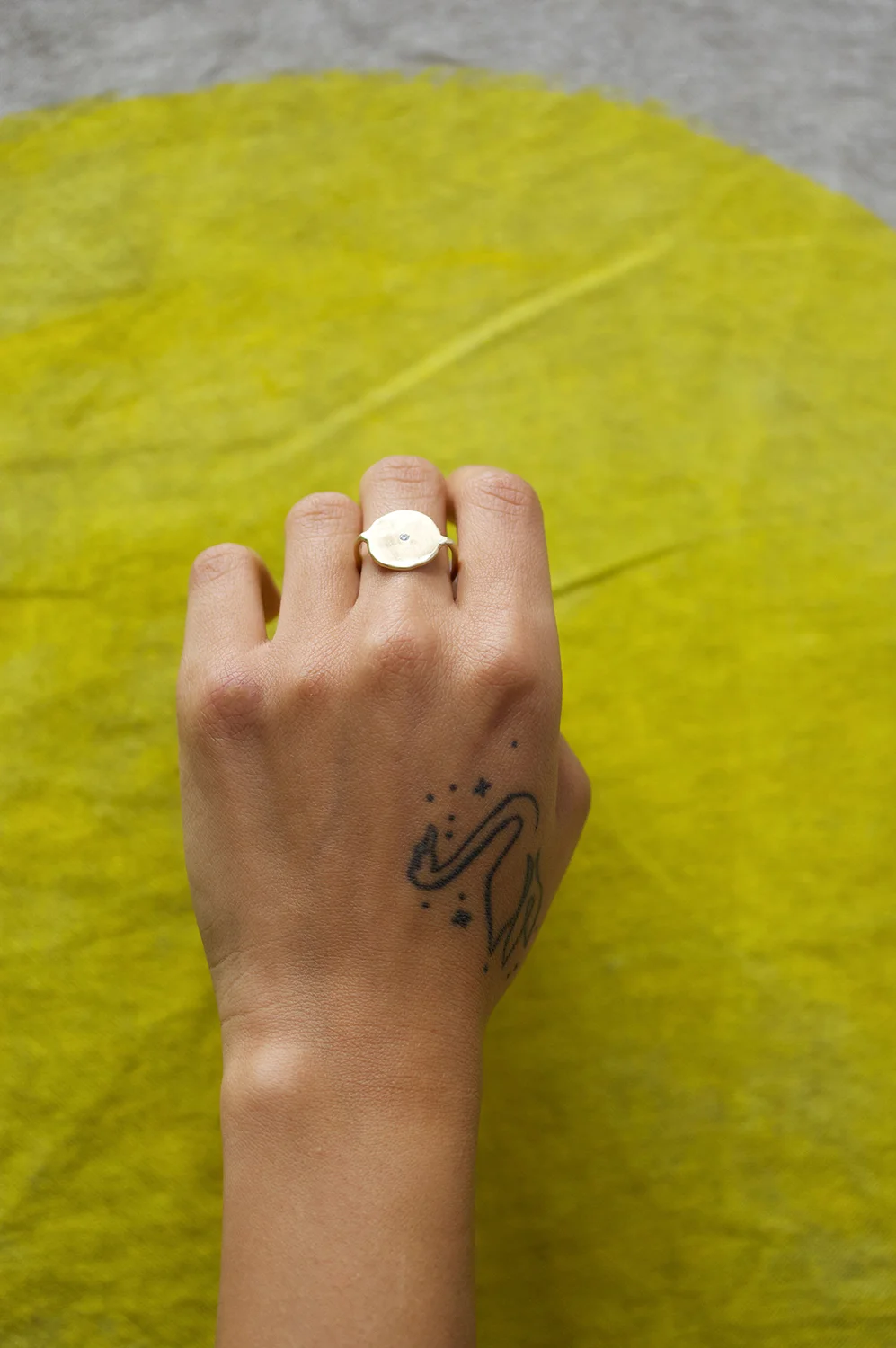 sol ring on sun painting small.jpg