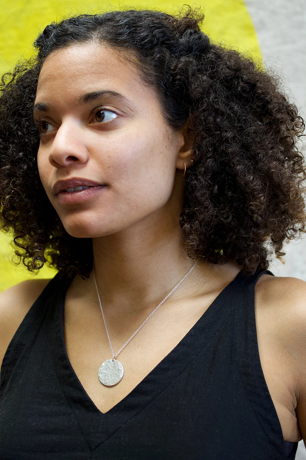 small wave hoops and sol necklace on kelsi small.jpg