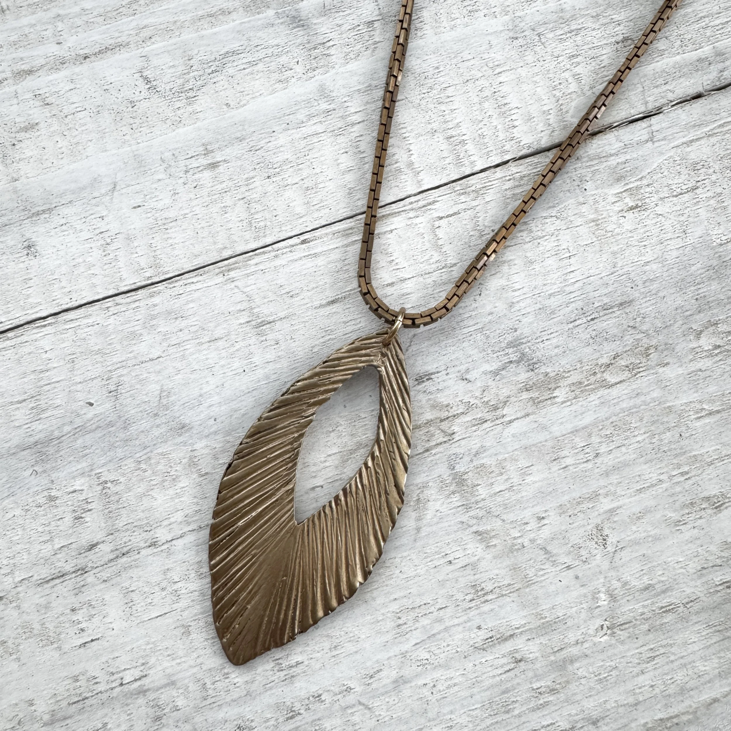 brass hammered pendant