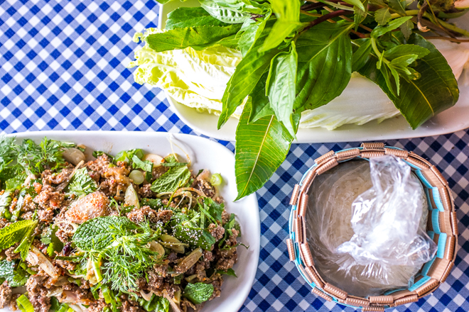  Laap Muu Khua Phrae, a spicy minced pork salad should be ordered with sticky rice. (Photo Credit: Eater )