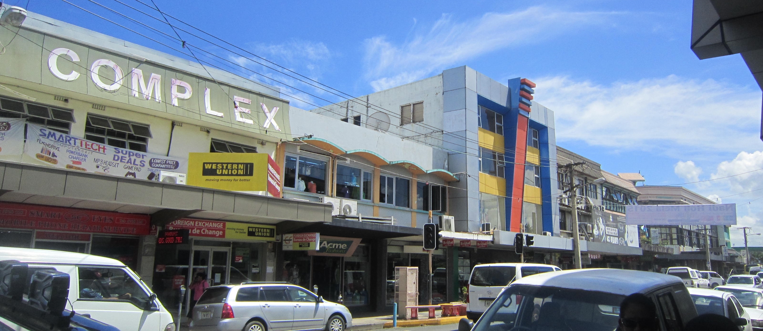 The downtown area of Nadi, Fiji, offers a good mix of both essential and touristy businesses. (Photo credit: Cherri Megasko)