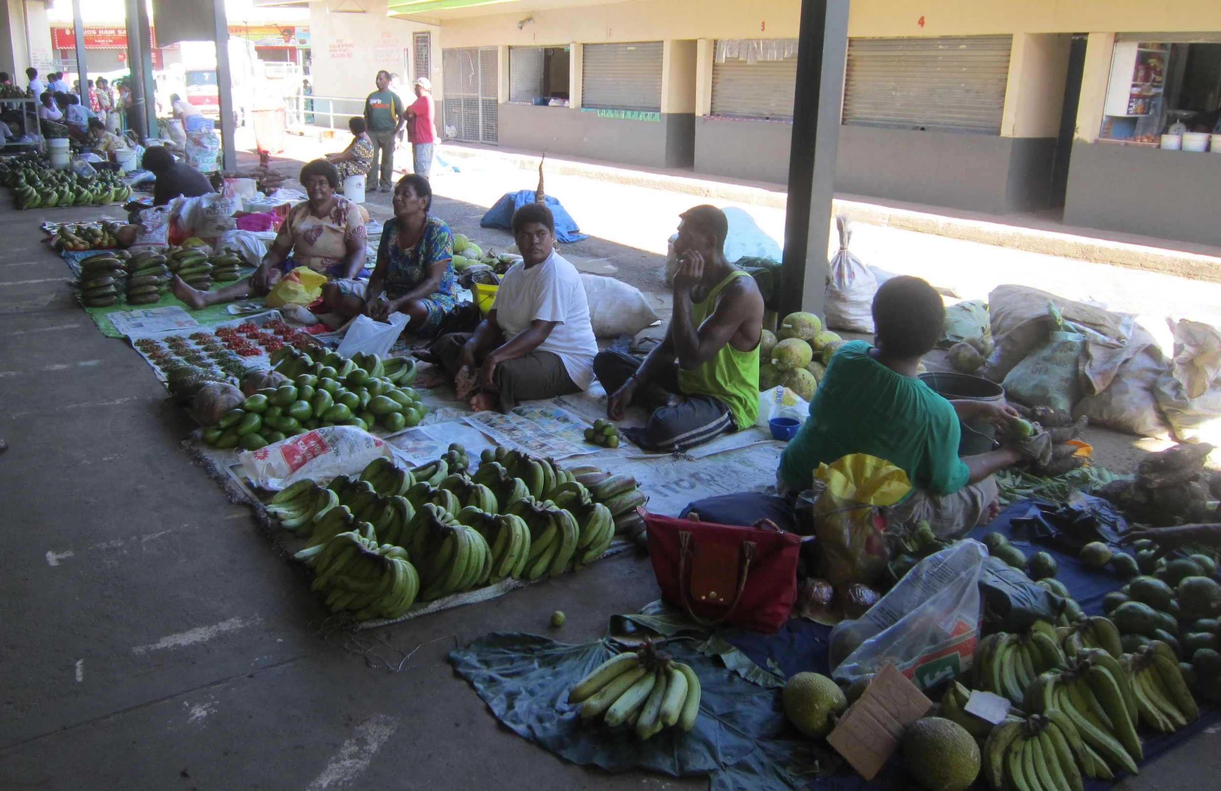 Local vendors sell fresh fish and produce in Nadi’s open air market. (Photo credit: Cherri Megasko)