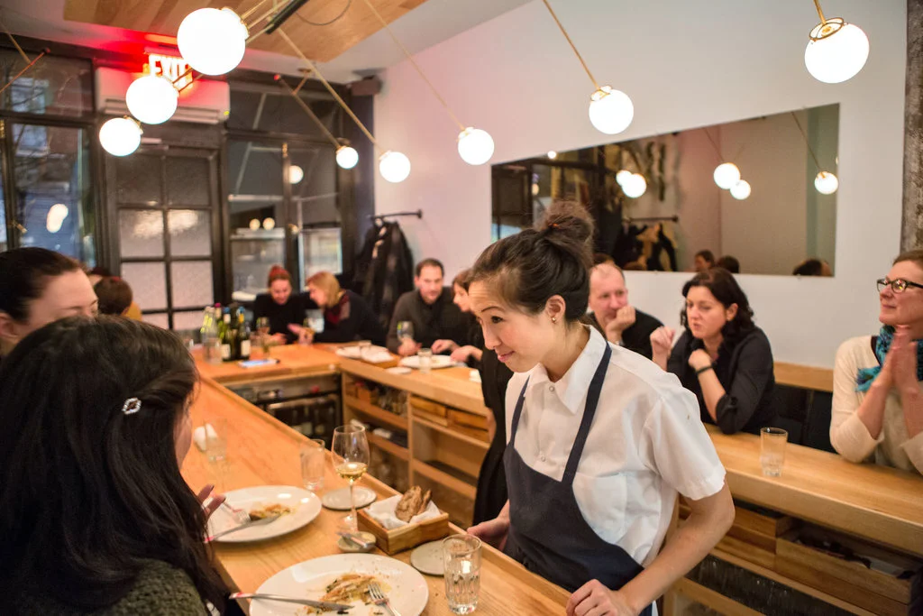 The design of the modest space at Semilla has maximized efficiency and comfortable, communal interaction. (Photo Credit: NYTimes)