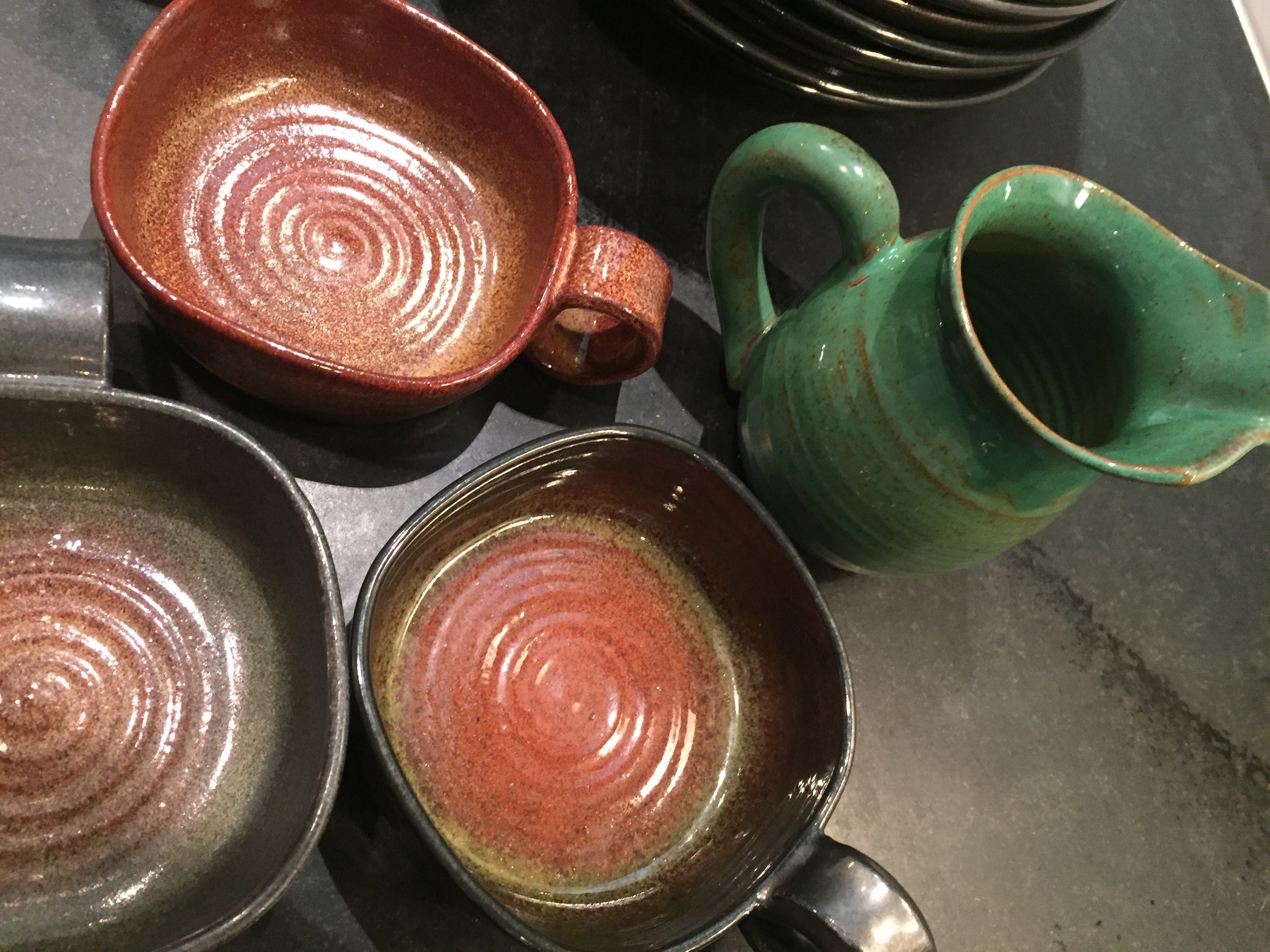 Traditional shapes and glazes of the now highly collectible Rowantree Pottery. 