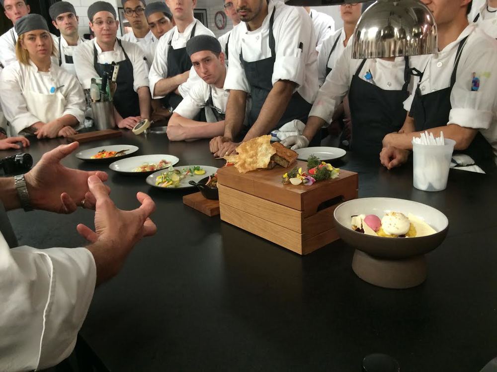 Executive Chef James Kent speaks to the cooks before five present their original dishes, having been selected to do so from all of the ideas submitted.