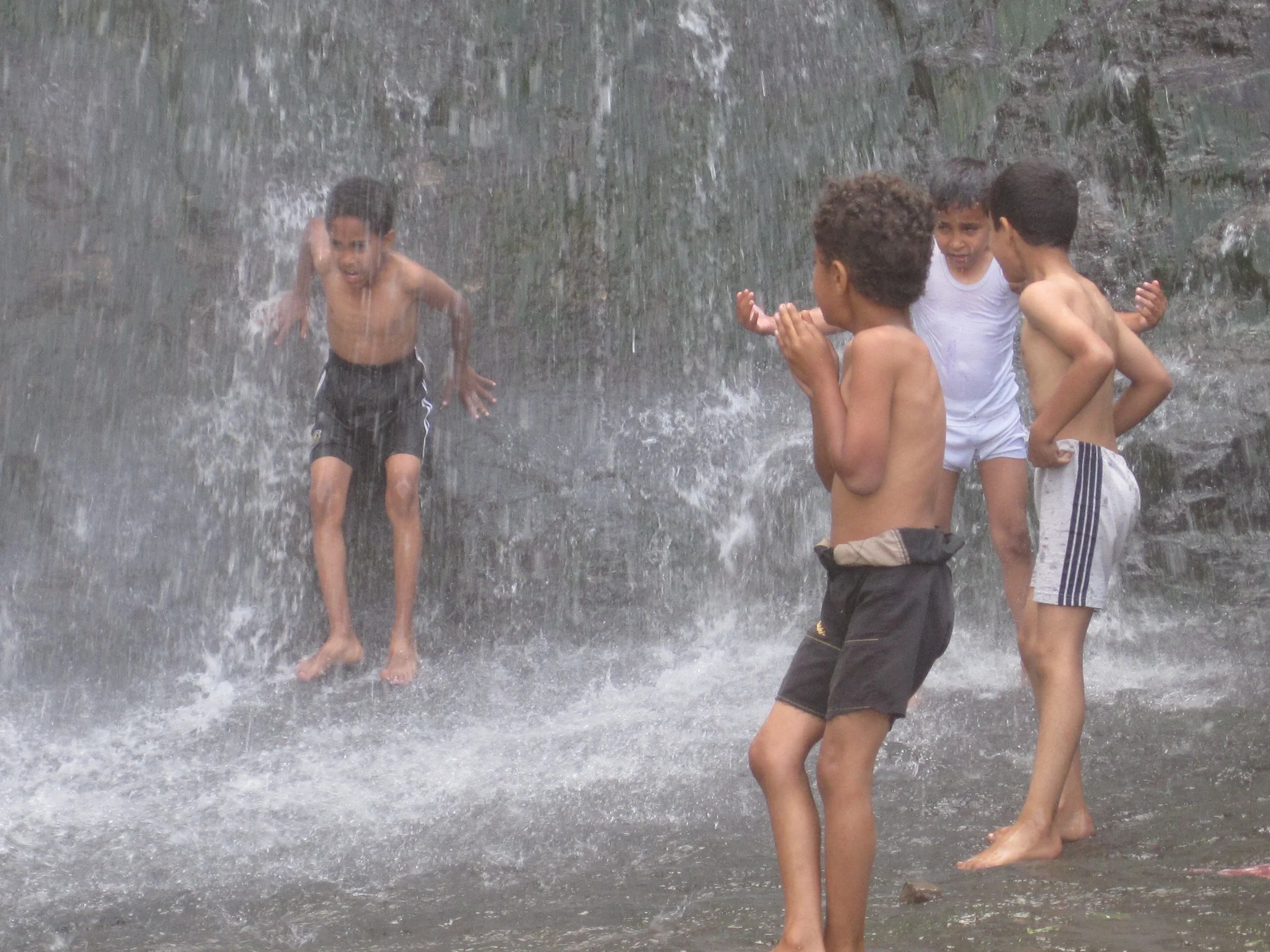 Taking a shower in the Ibb waterfall