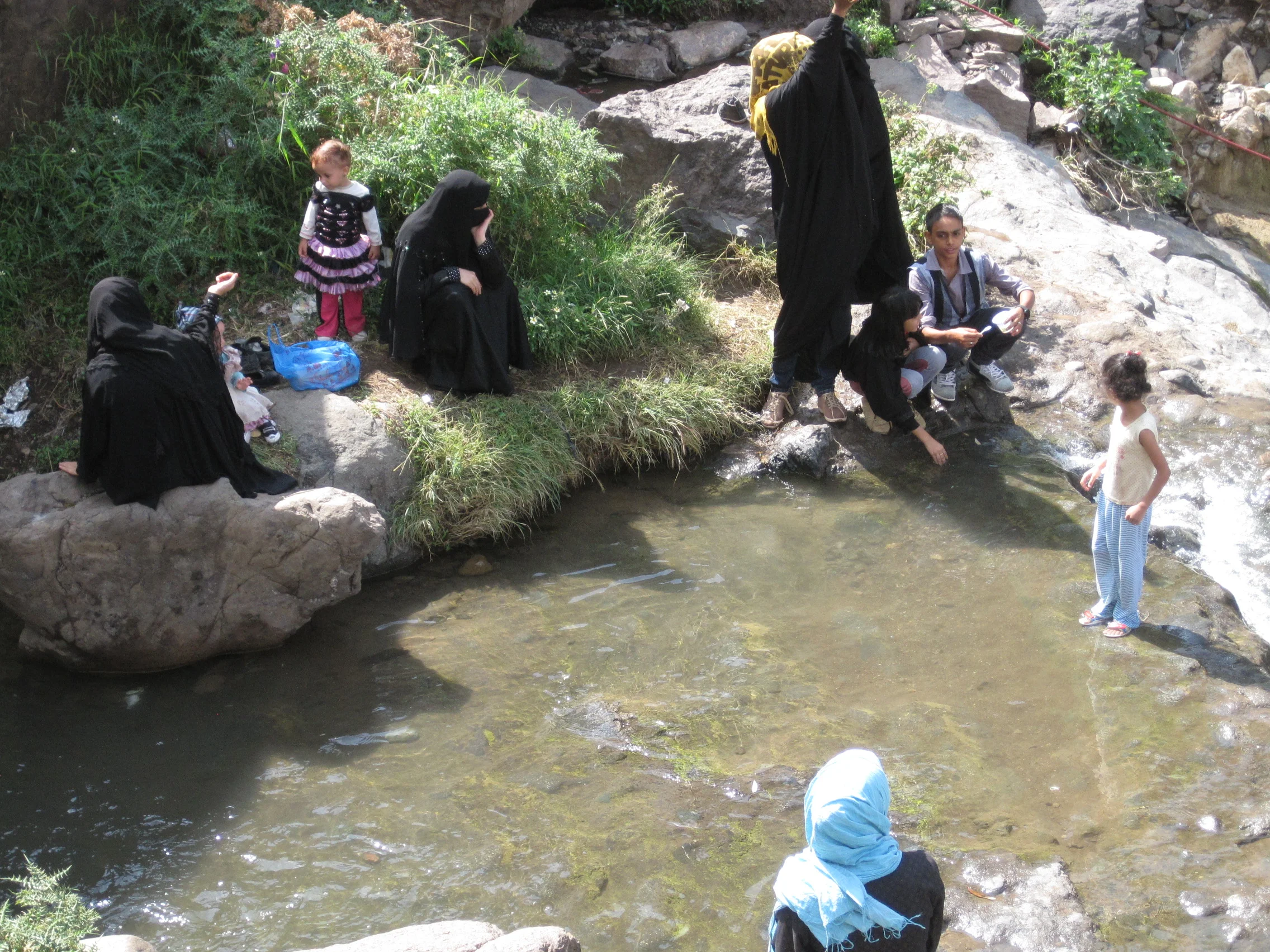 Relaxing at the top of the Ibb waterfall