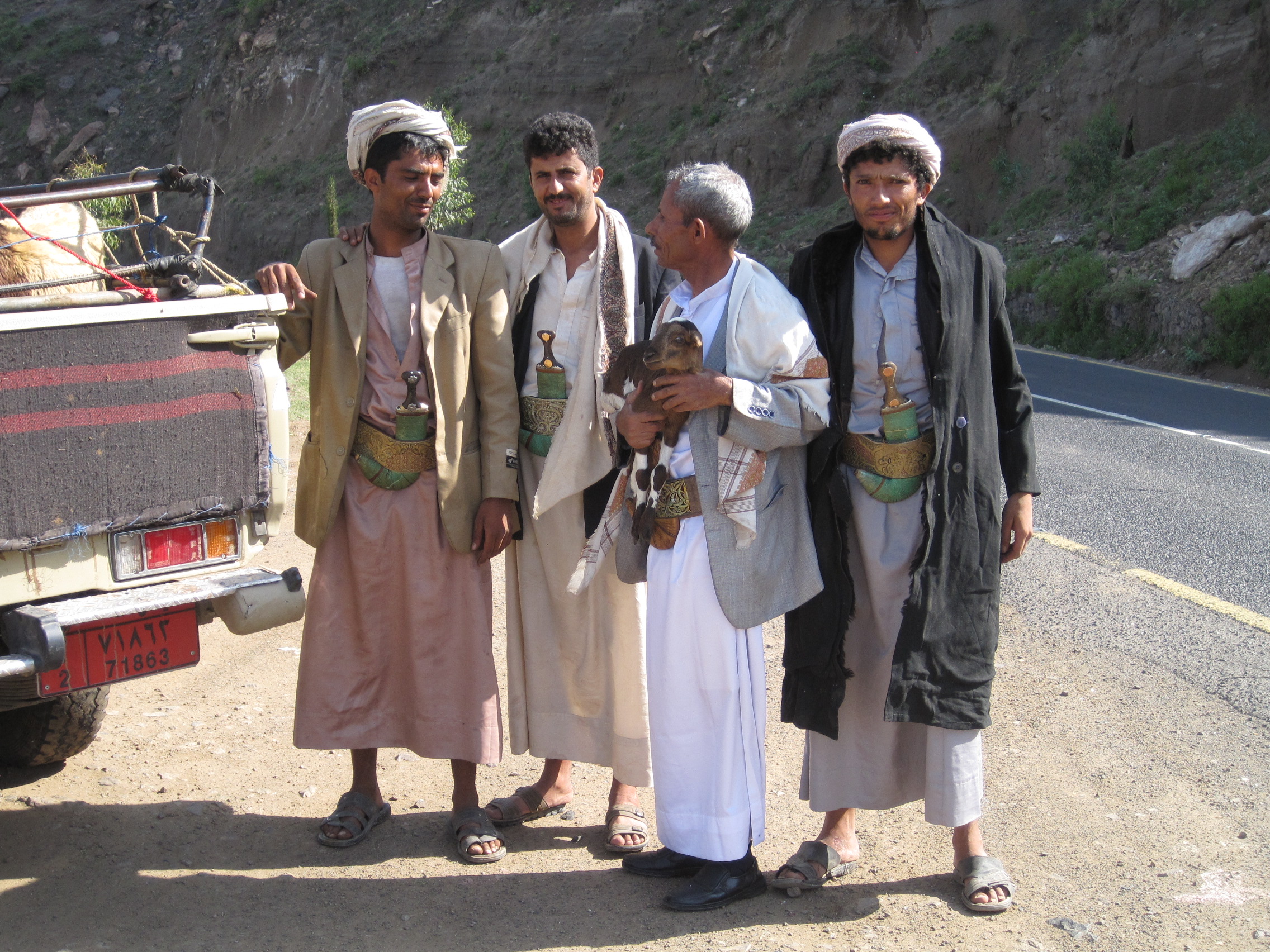 Goat vendors on the road
