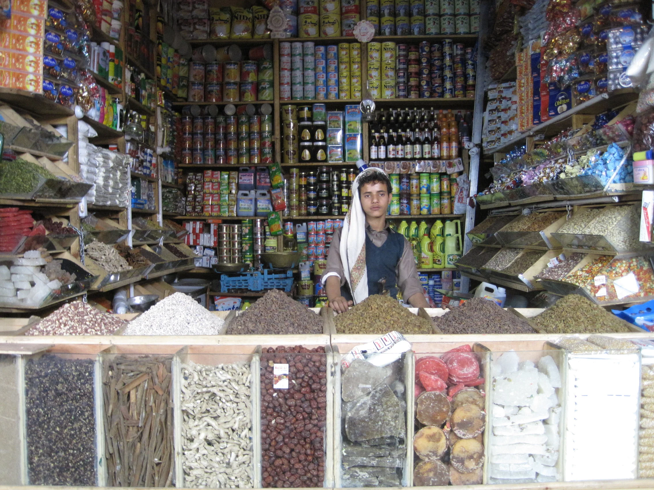 Serious young vendor at Sana'a Old City market