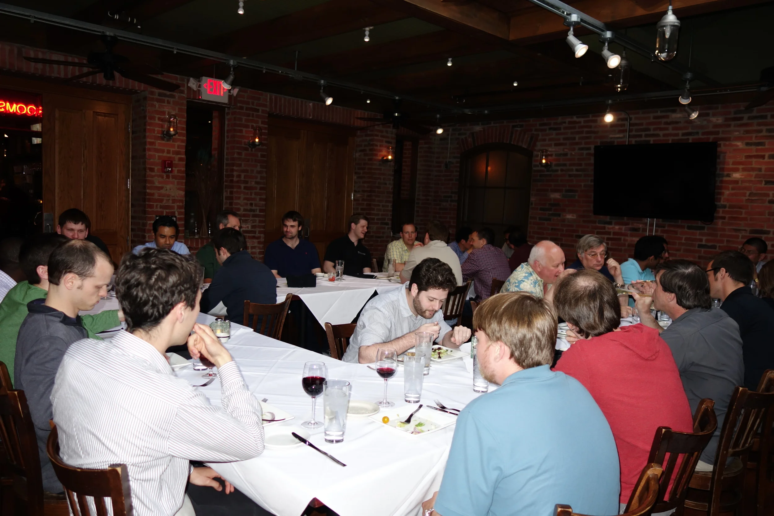  MOST OF THE GROUP ENJOYING DINNER IN THE Two25 Restaurant in the mark twain hotel.