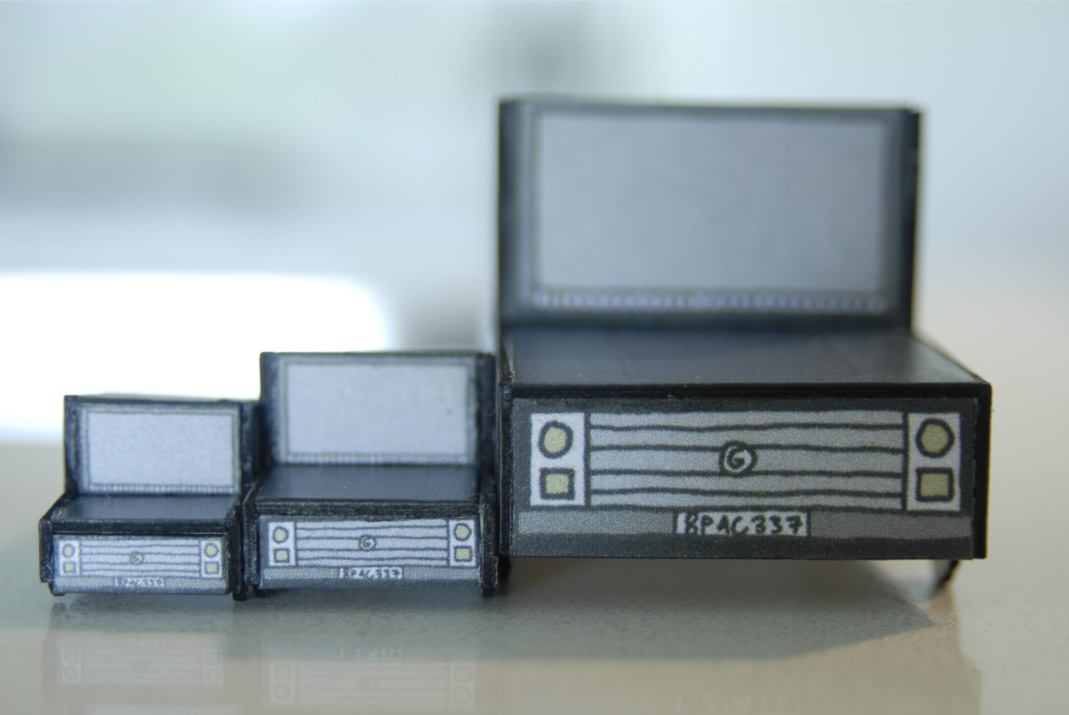 3 sizes of miniature cars for different sized sets