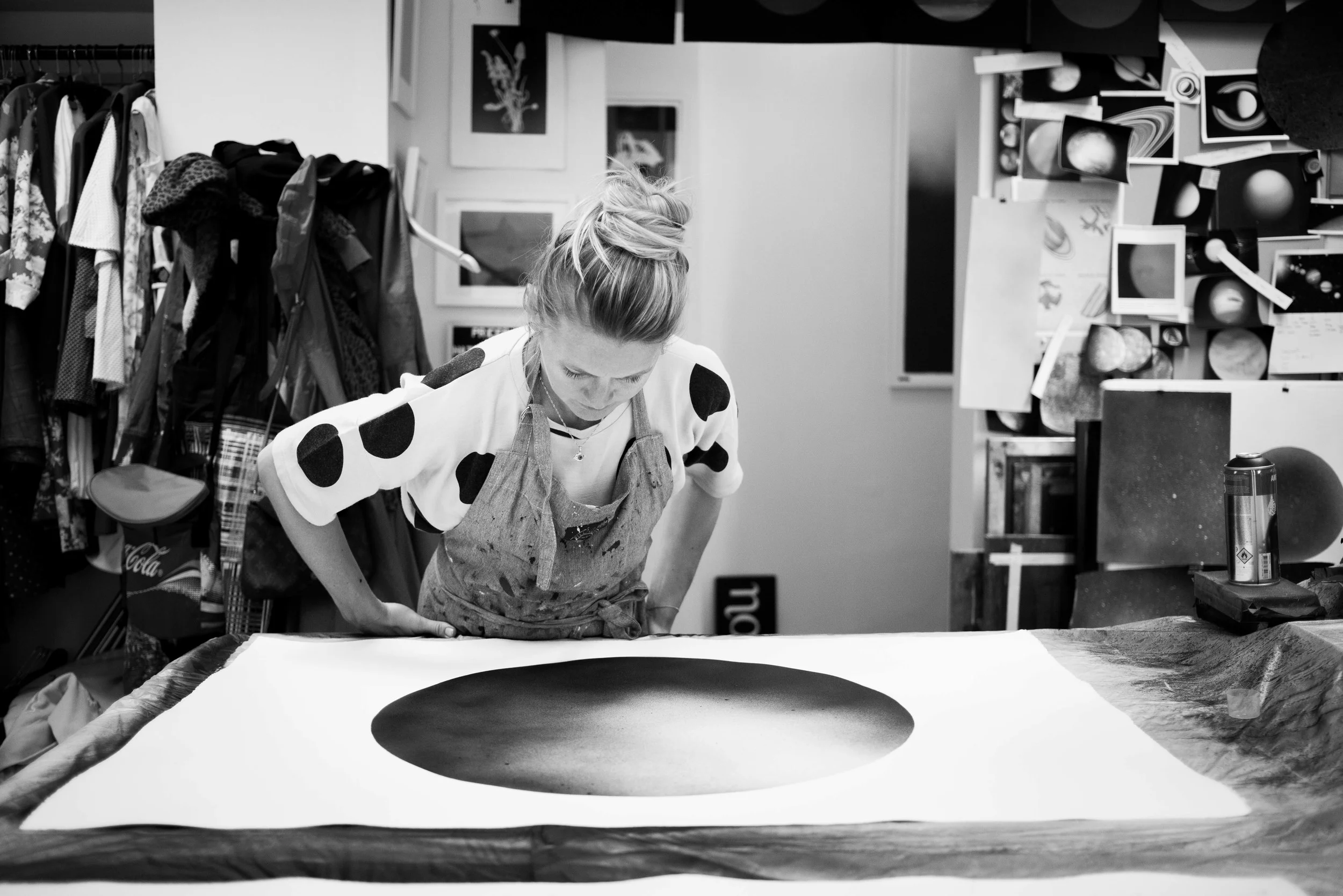 Anne Nowak inspecting her 'White Moon.'