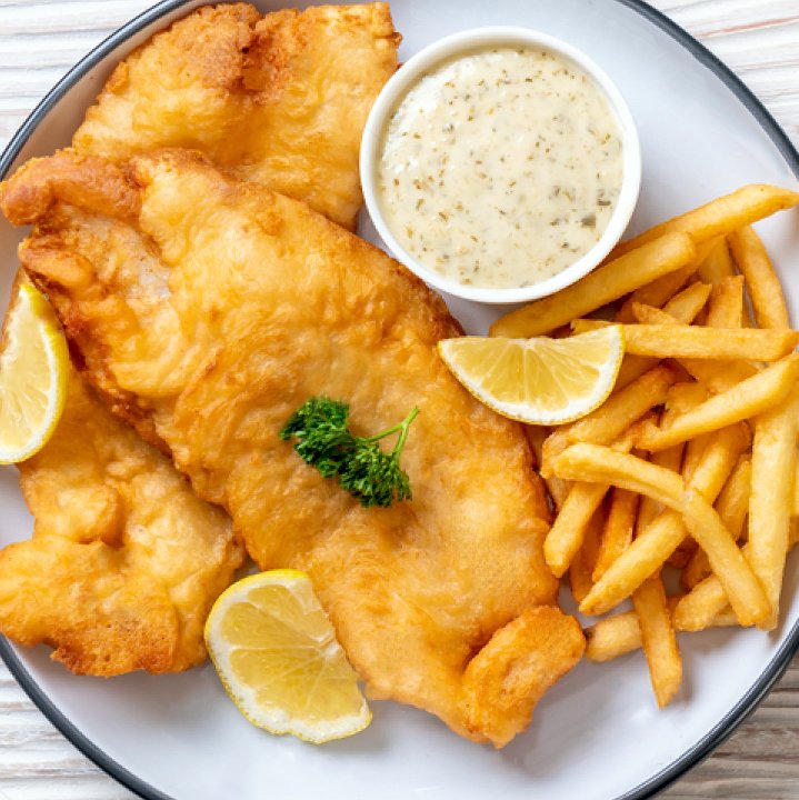 stock-photo-fish-and-chips-with-french-fries-unhealthy-food-1436084612.jpeg