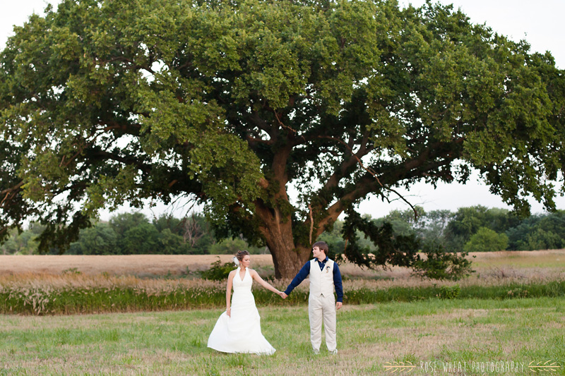 34.+bride_groom_tree_holding_hands.jpg