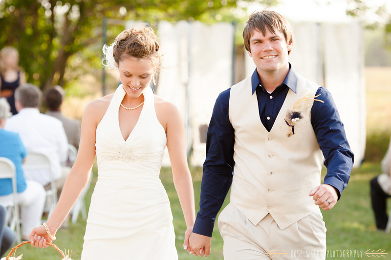 31.+bride_groom_kiss_aisle-2.jpg