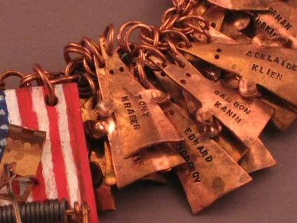 Trapped by Patriotism necklace (detail)