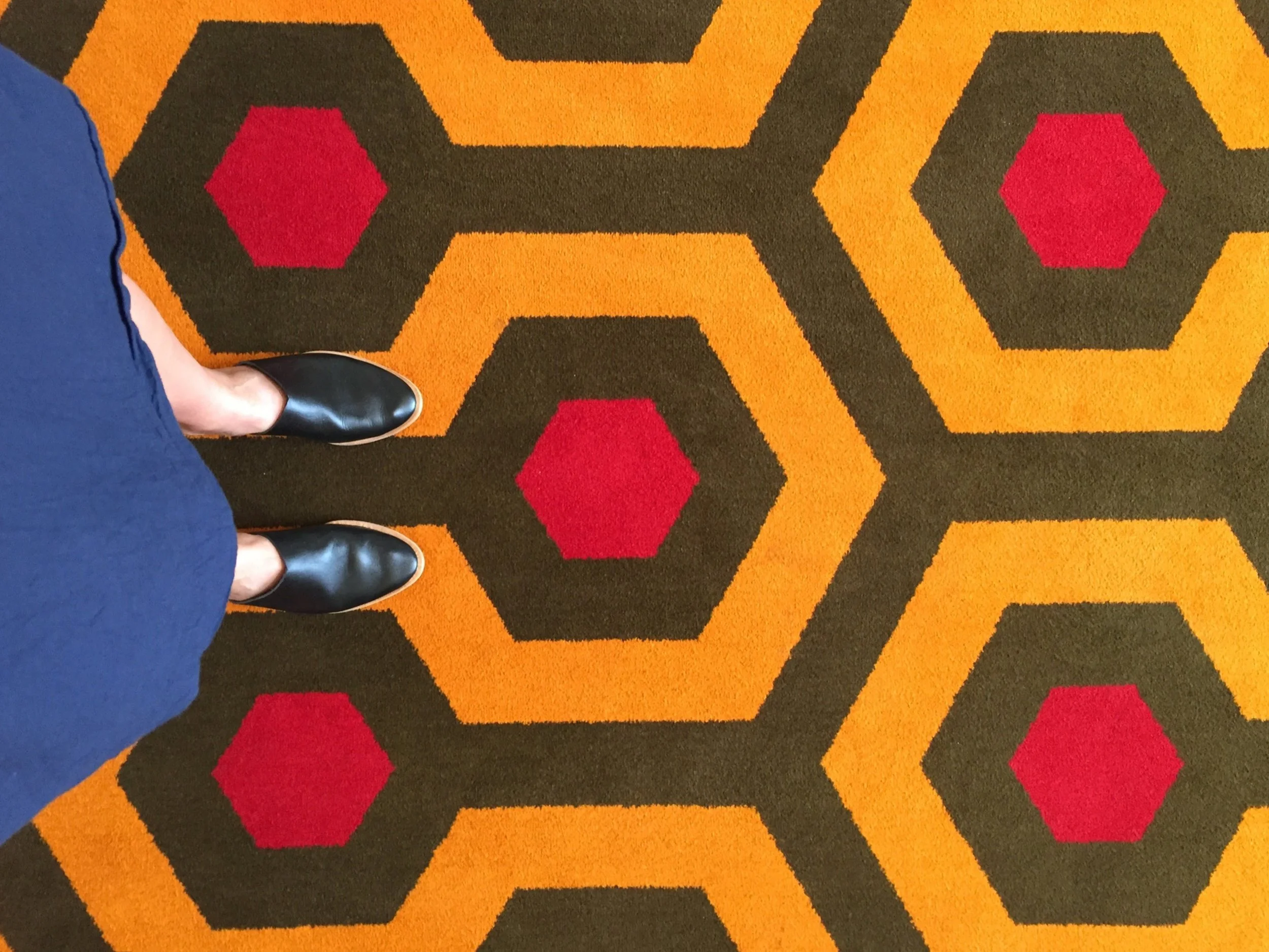 DAY FOUR at this point, I'm admiring the hotel carpet inspired by Stanley Kubrick's film The Shining.