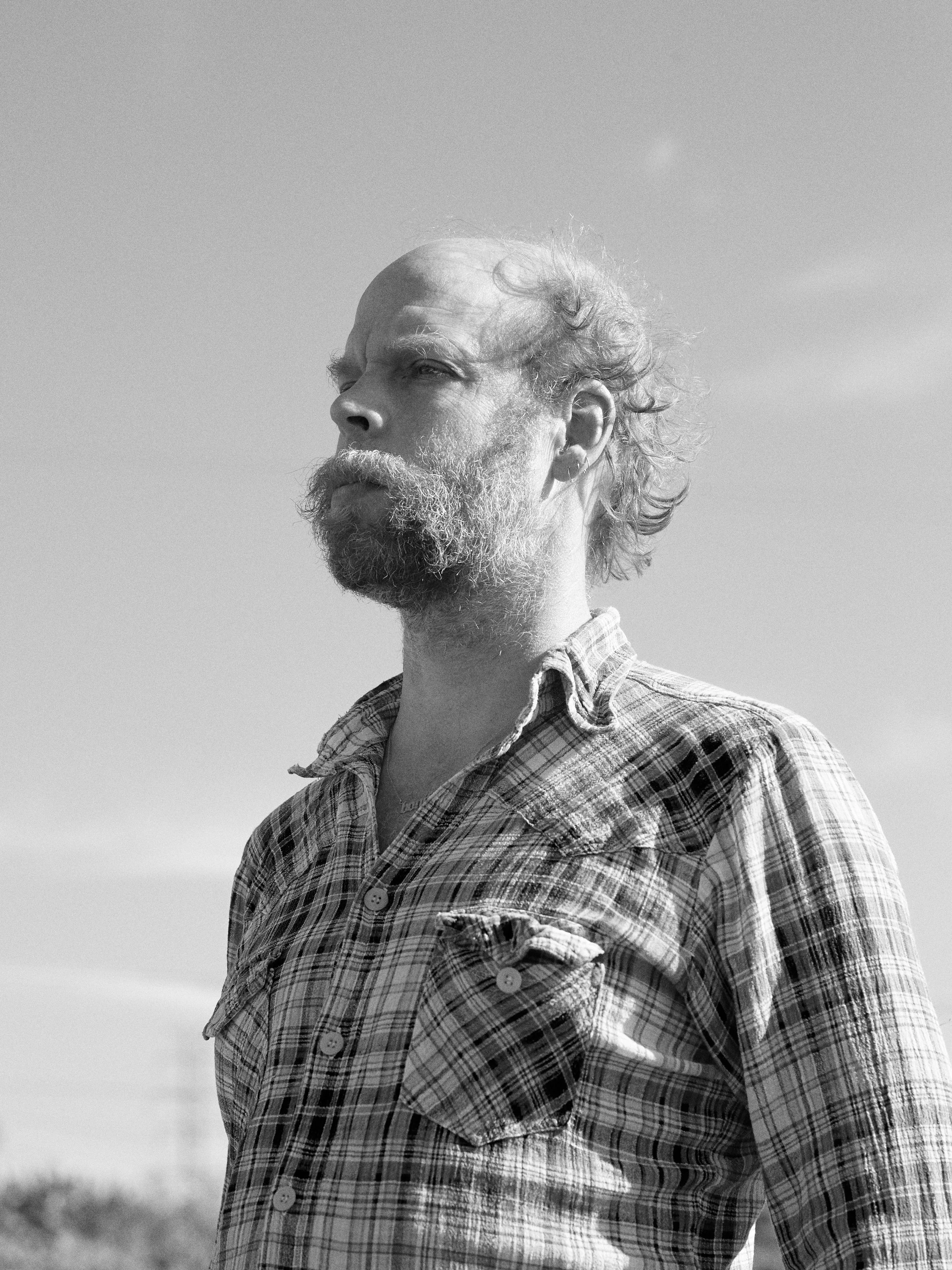 A black-and-white photo of a person.