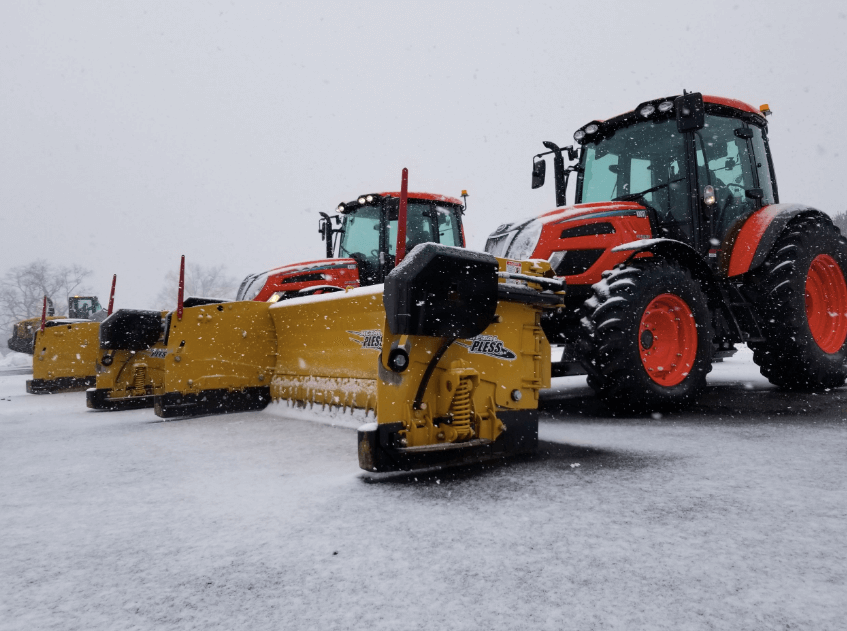 Tractors with Metal Pless Plows.png