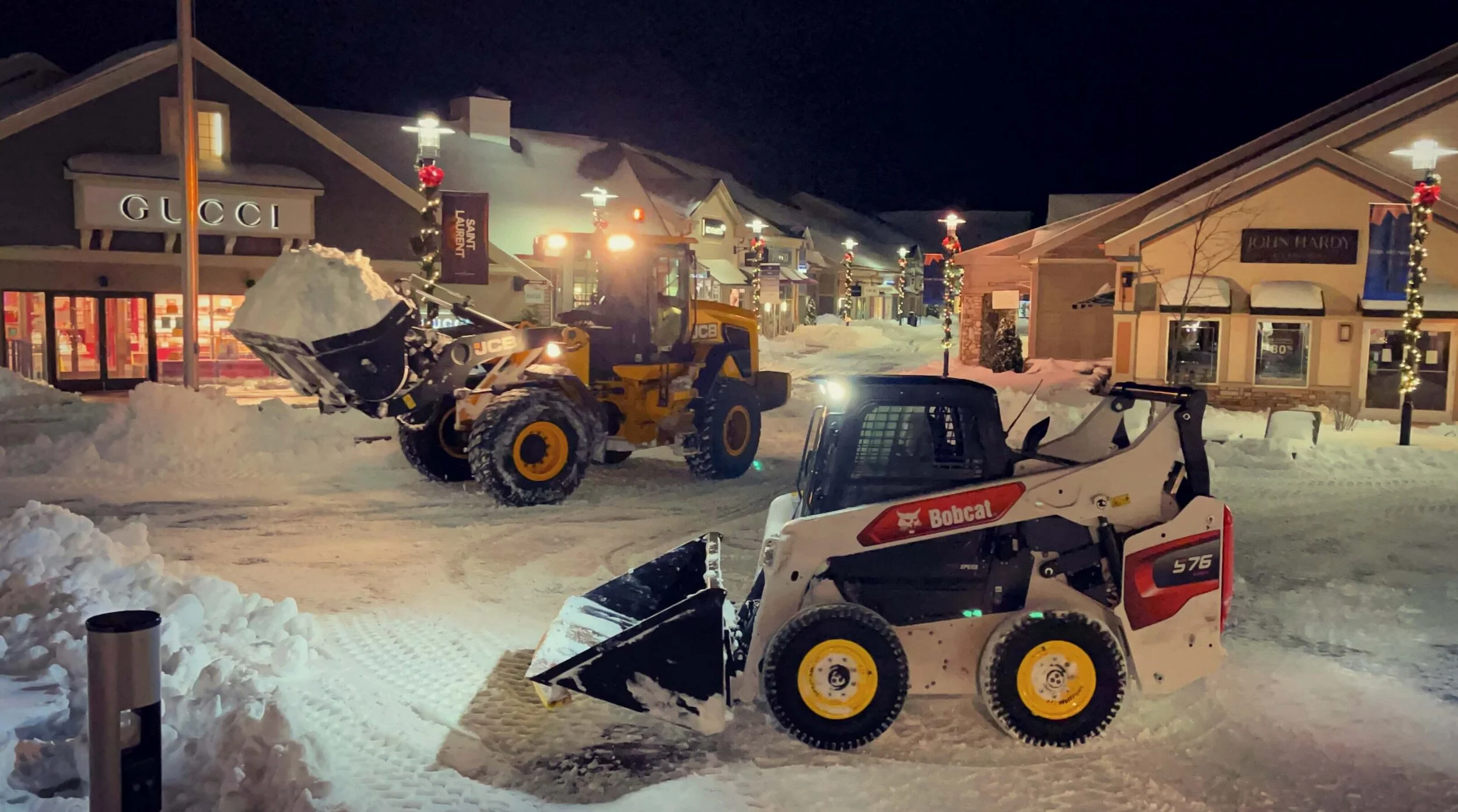 Bobcat and JCB Clearing Out Snow.jpg