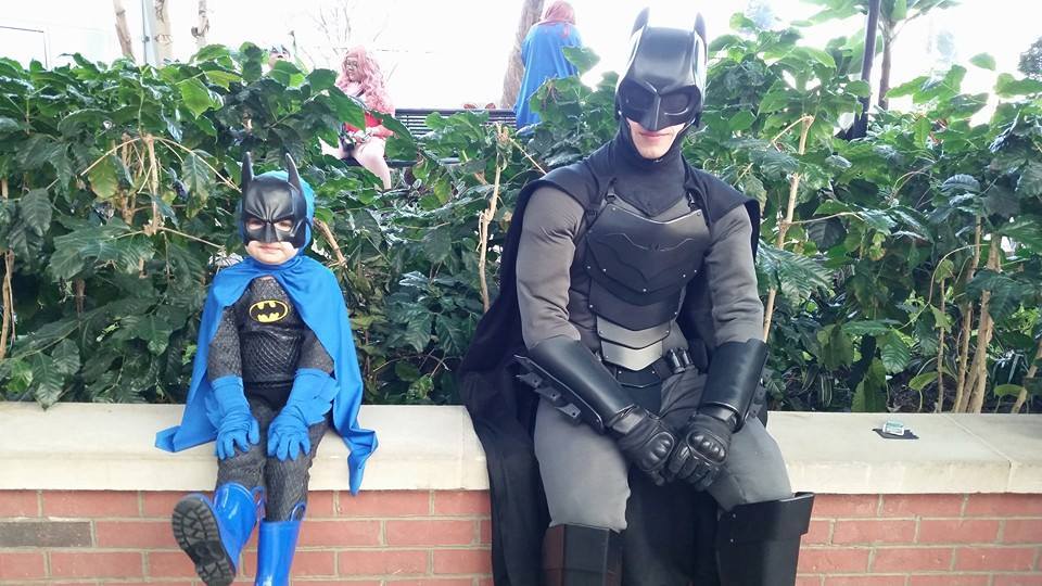 I bet that little kid feels like a real fucking idiot in his crappy Bat-suit. It's probably not even machete proof.