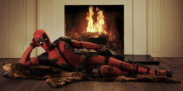 Reynolds looks great in the official Deadpool costume, naturally.