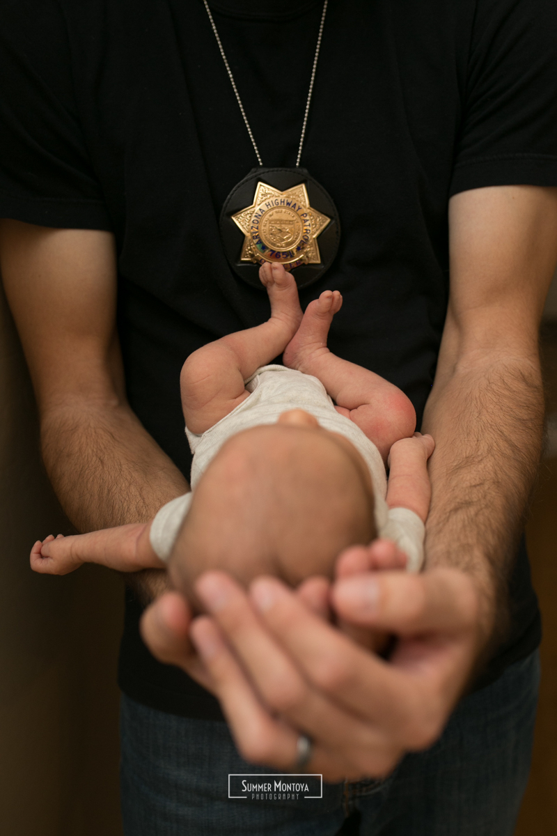 newborn-girl-with-police-officer-dad