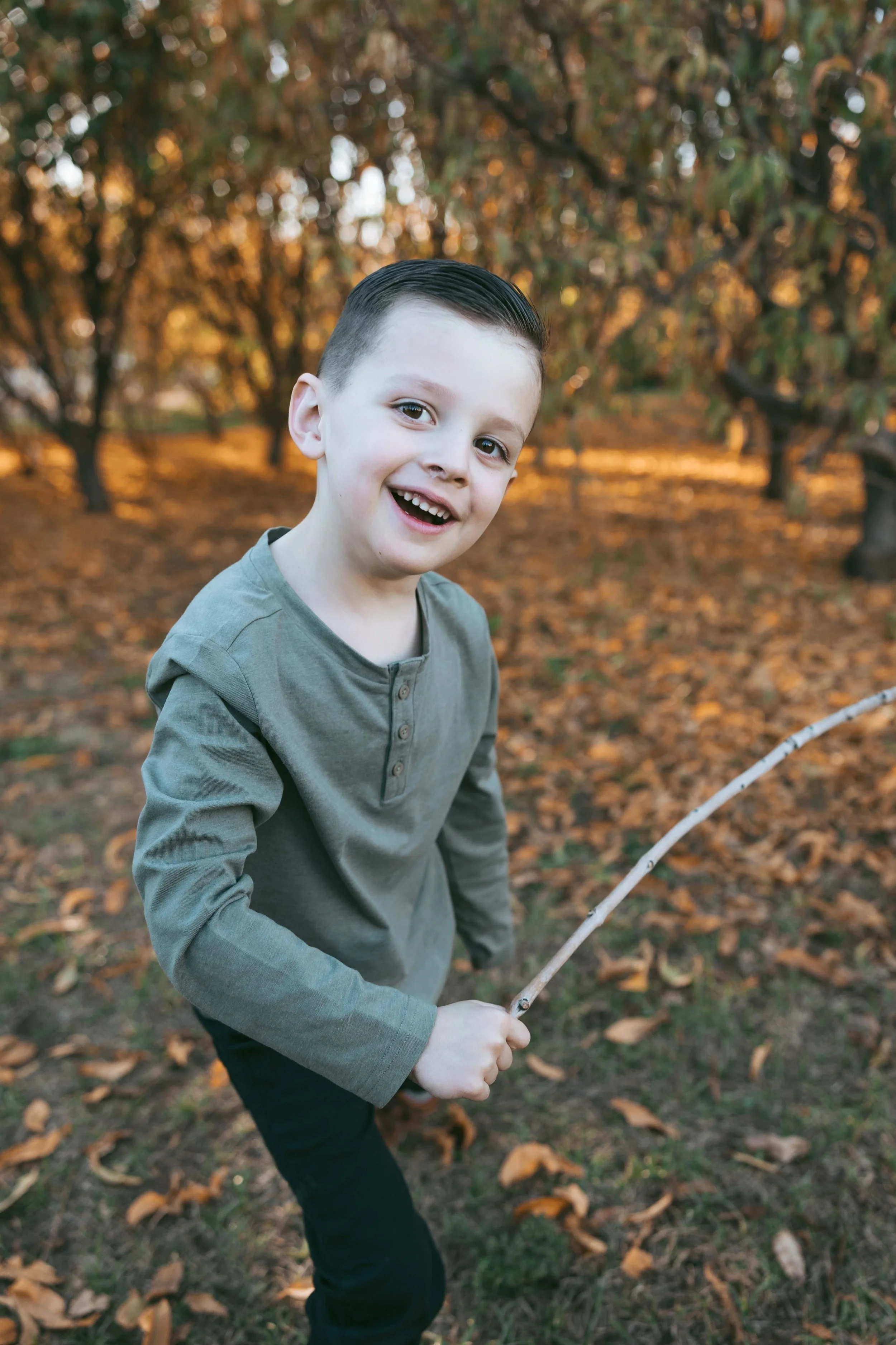 Child portrait with fall foliage at Agritopia Orchard Gilbert
