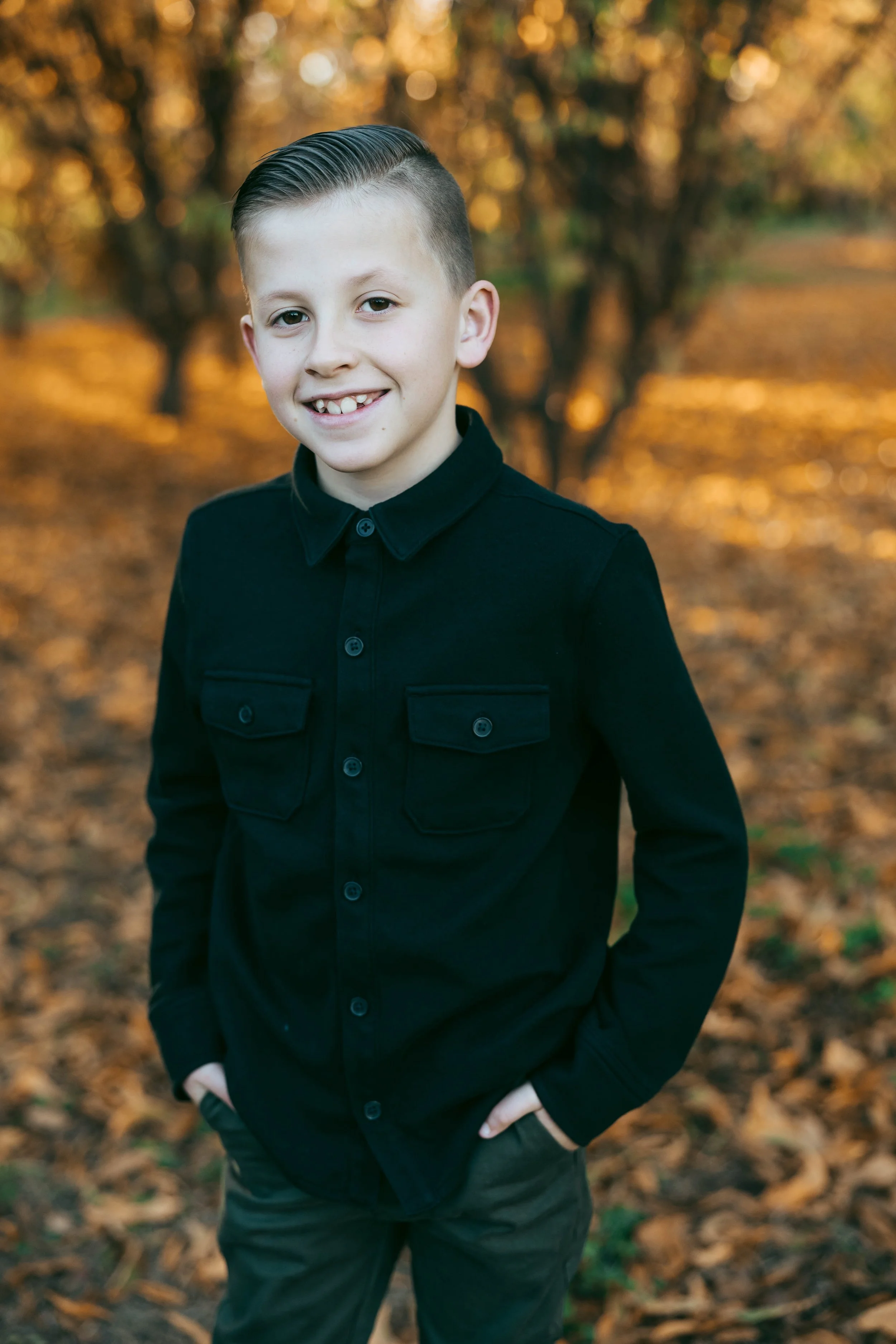 Natural kid photo with autumn leaves at Agritopia