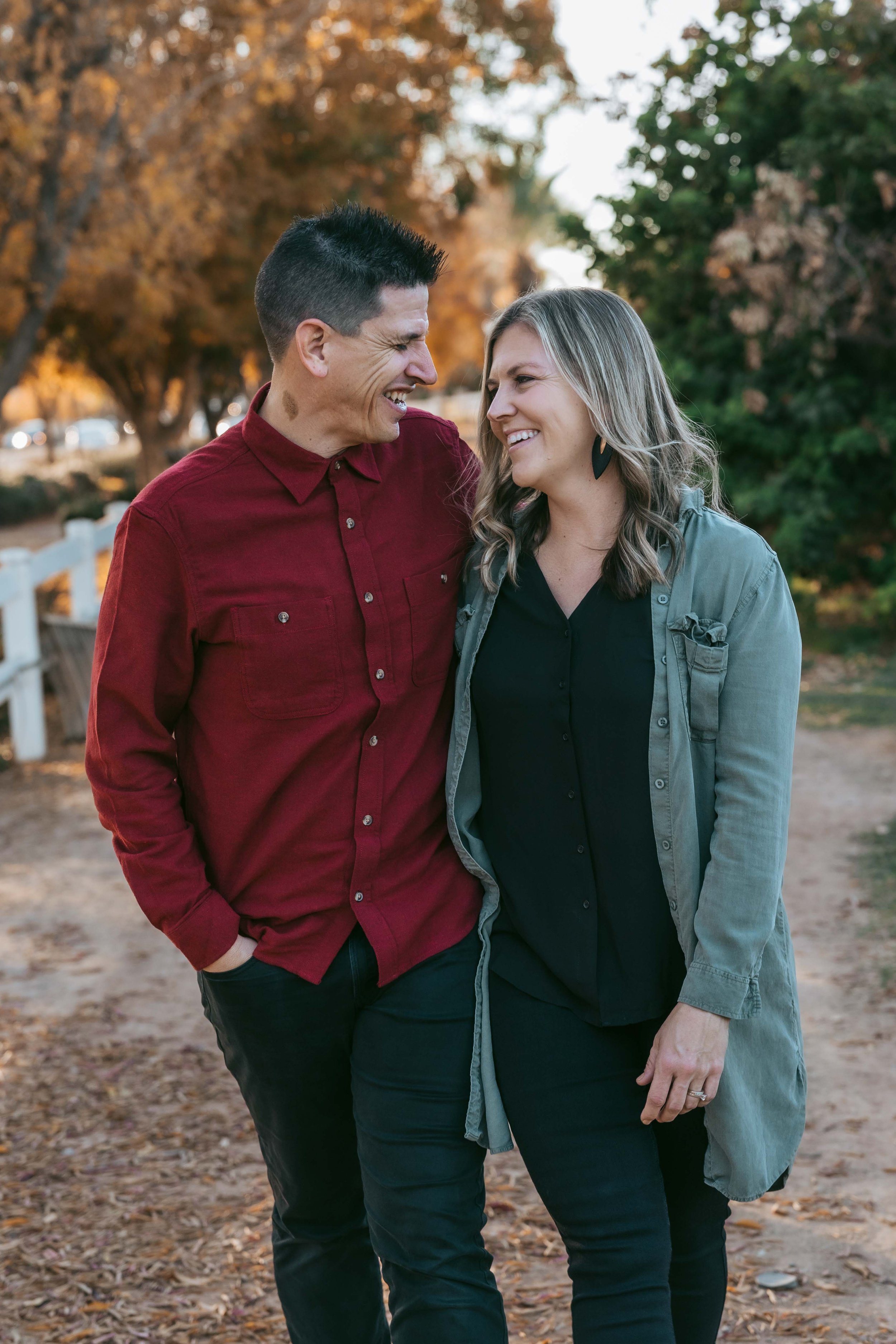 Mom and dad portrait with autumn colors at Gilbert family session