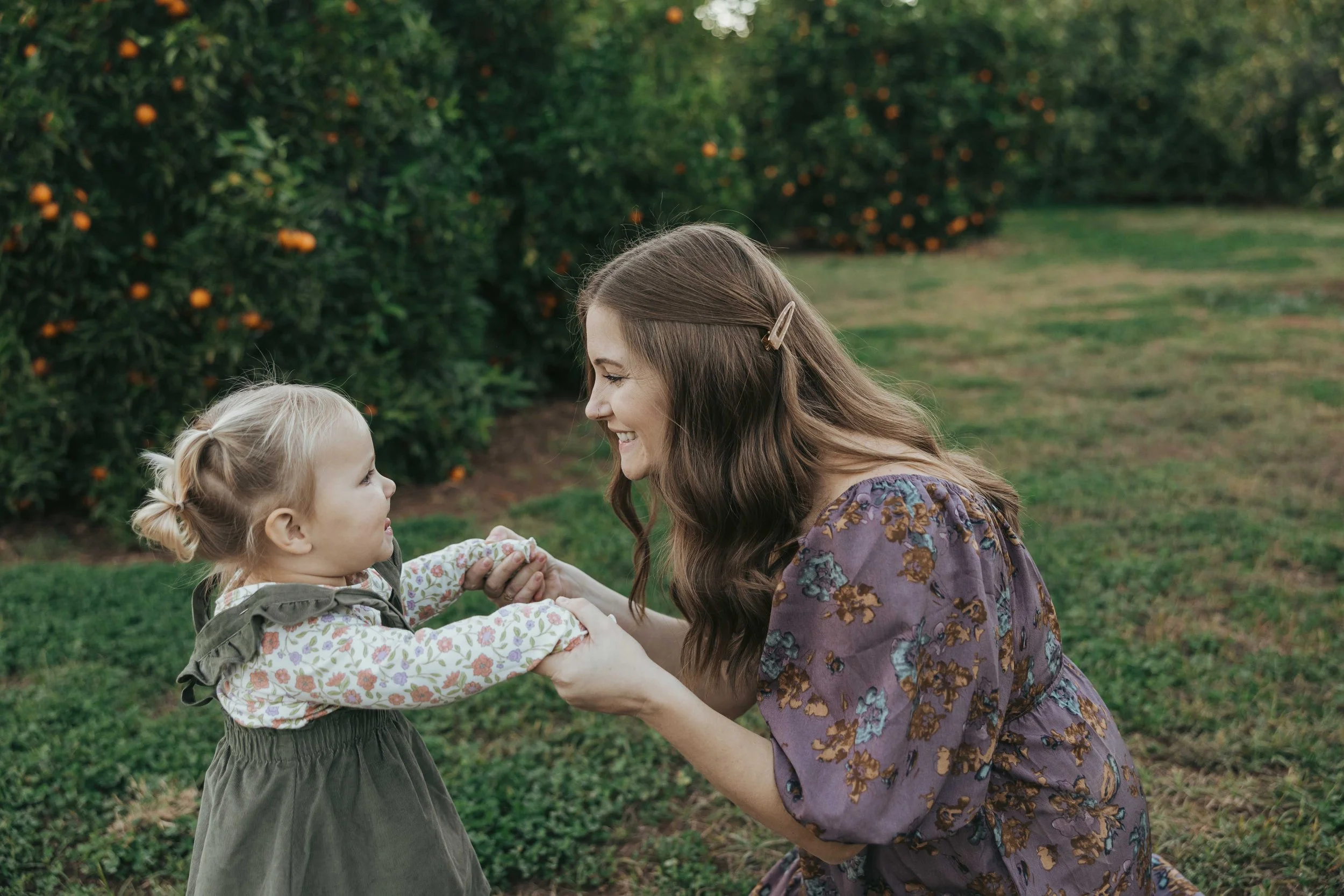Mom and daughter in Gilbert smiling at each other.