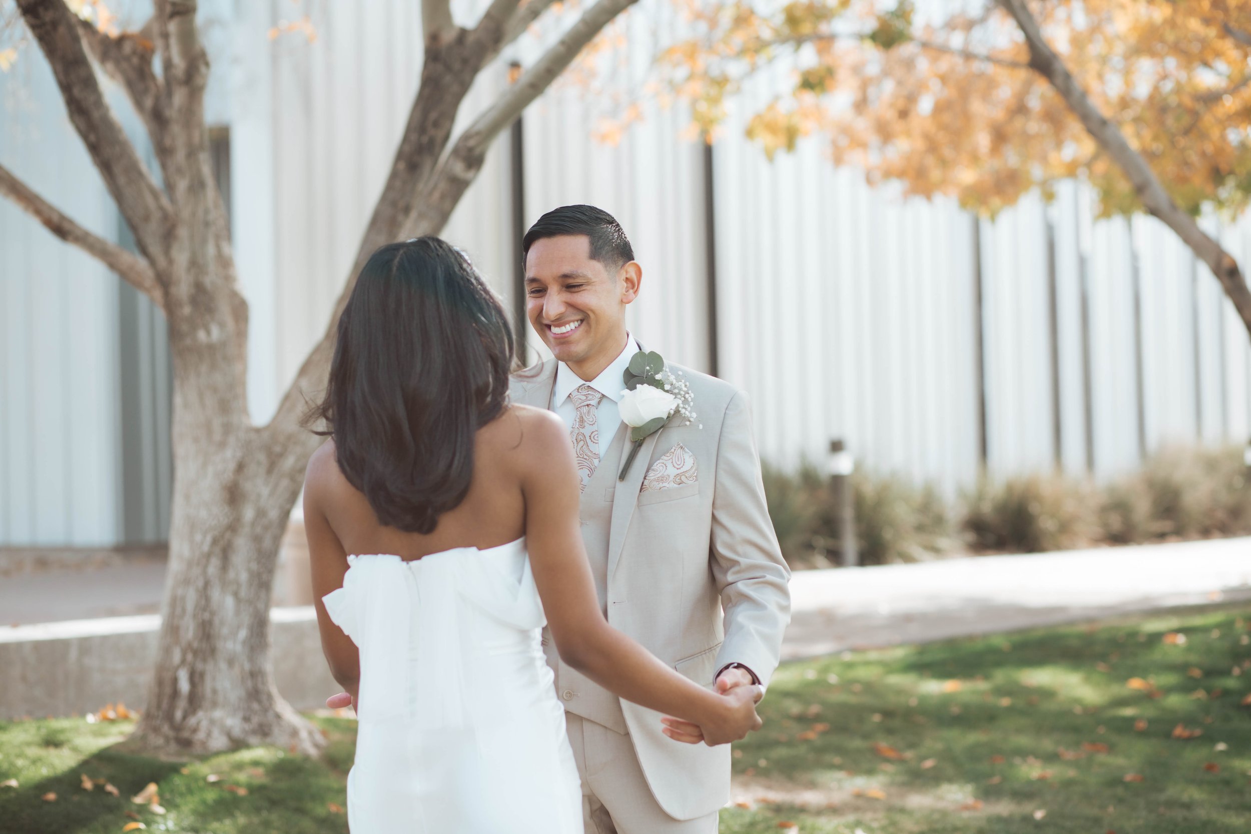 Intimate first look wedding moment at their home church in Gilbert Arizona