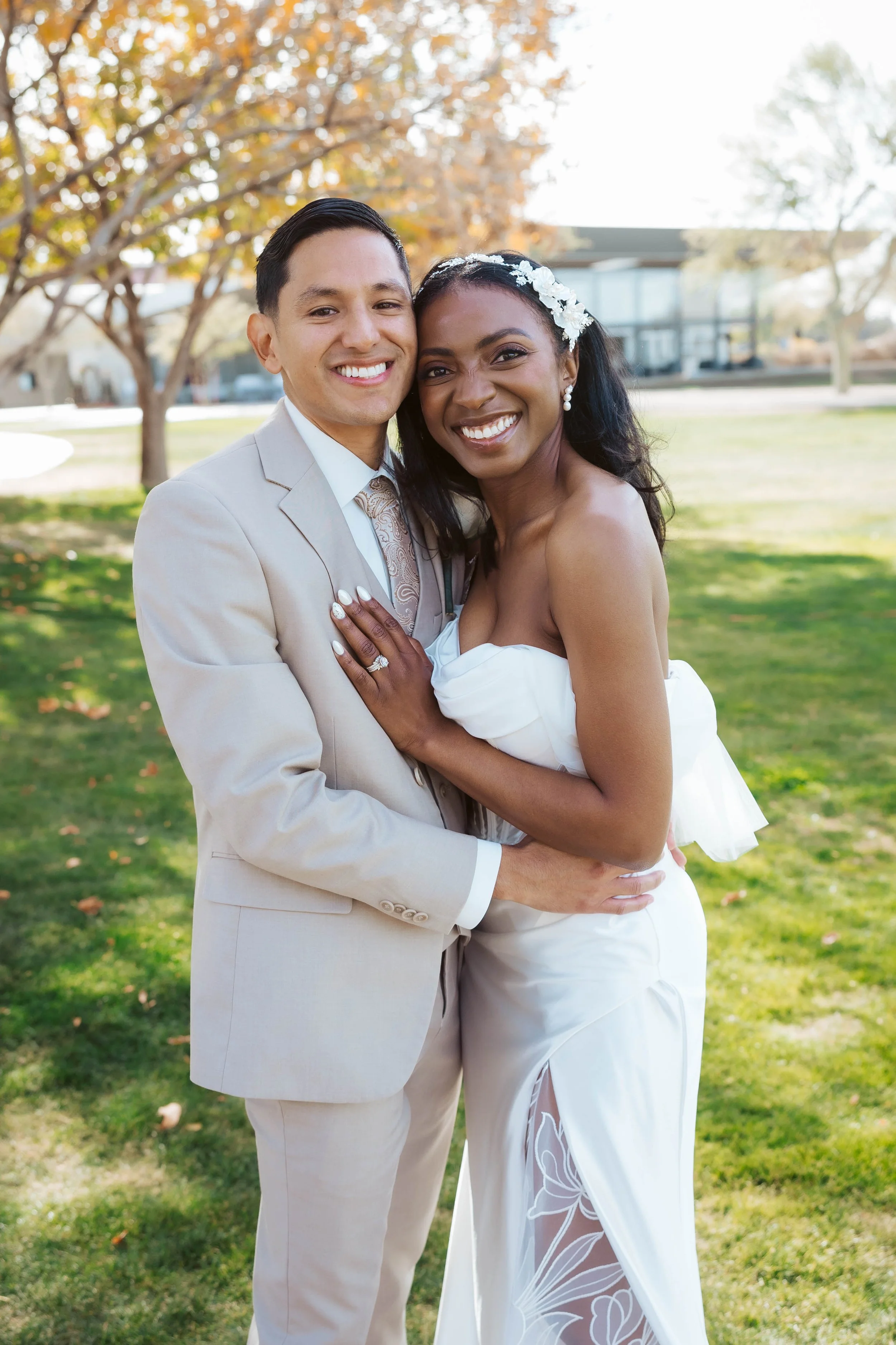 Jade and Abel laughing during relaxed bridal portraits before the ceremony