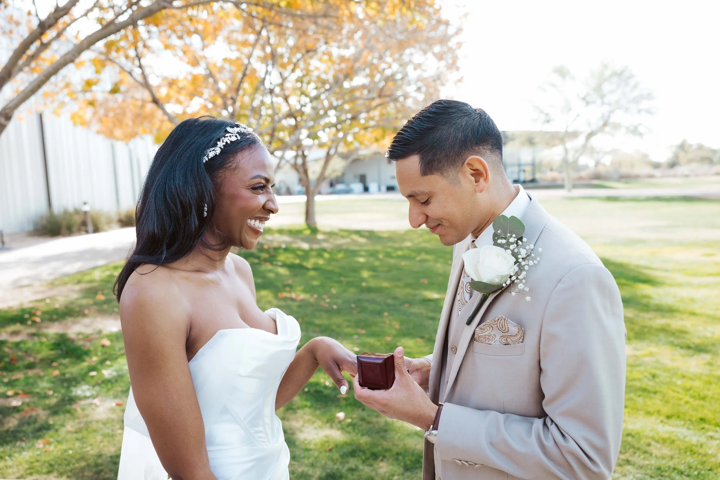 Bride and groom sharing a ring exchange during their first look at Redemption Church