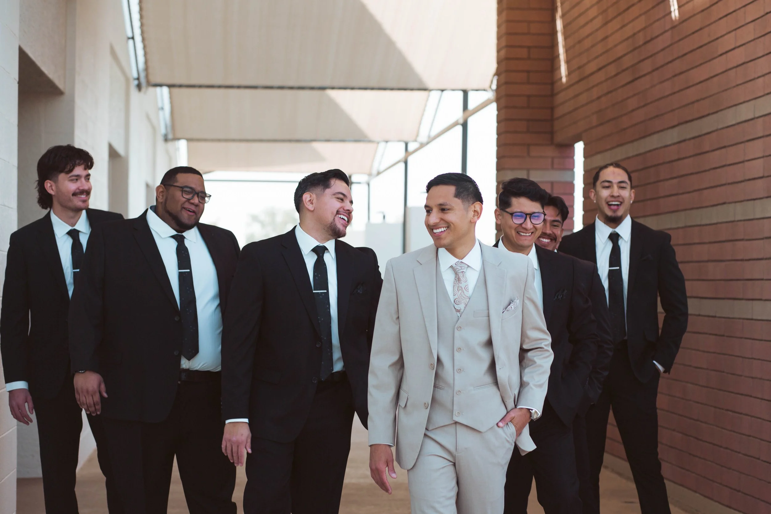 Groom and groomsmen portraits at Redemption Church in Gilbert