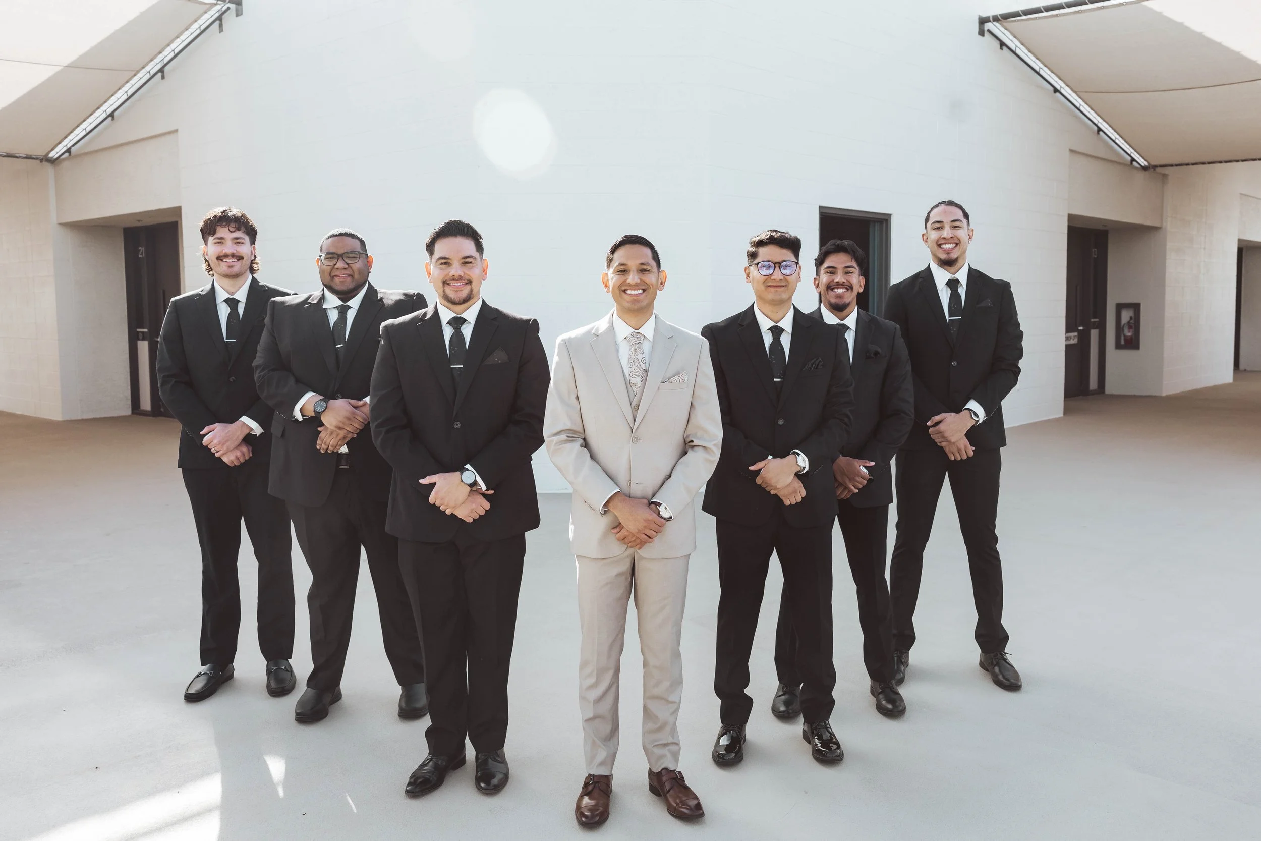 Relaxed groomsmen photos at a Redemption Church wedding