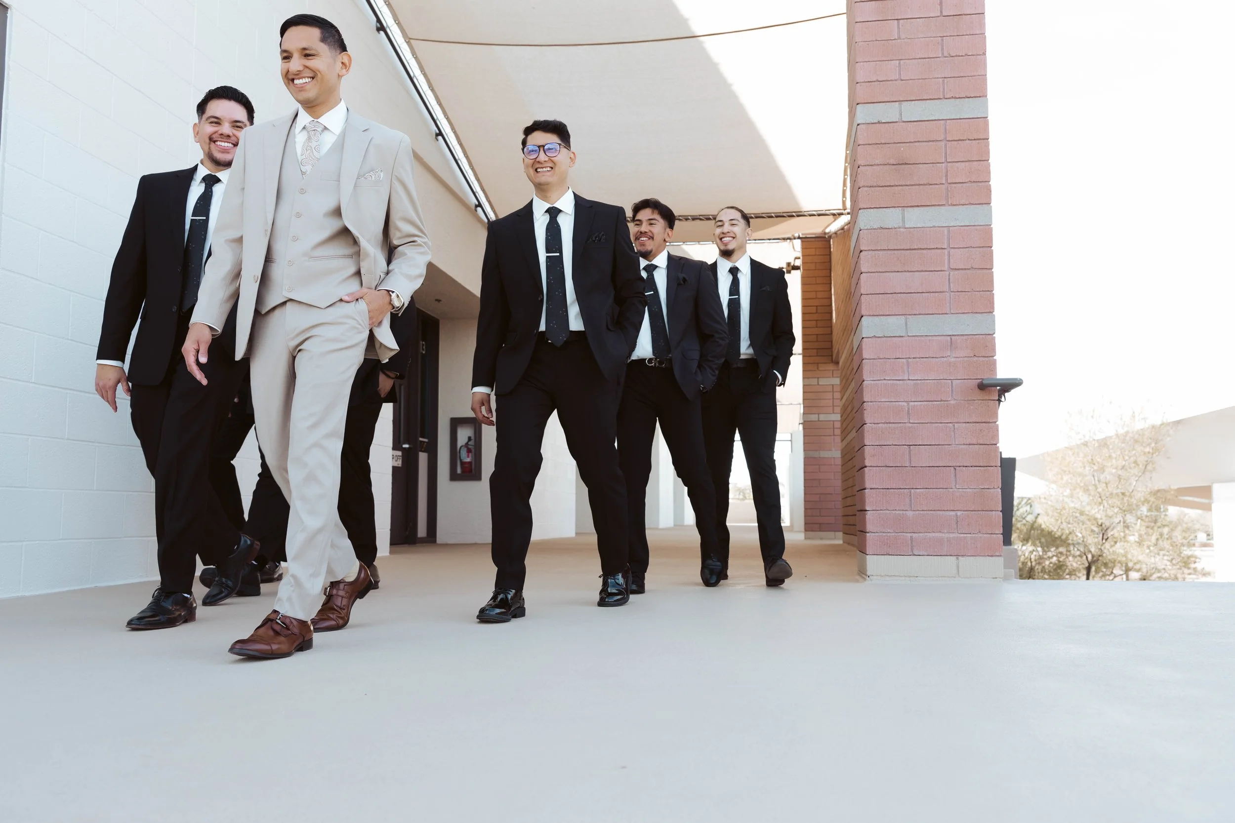 Abel with his groomsmen before the ceremony at their Gilbert wedding