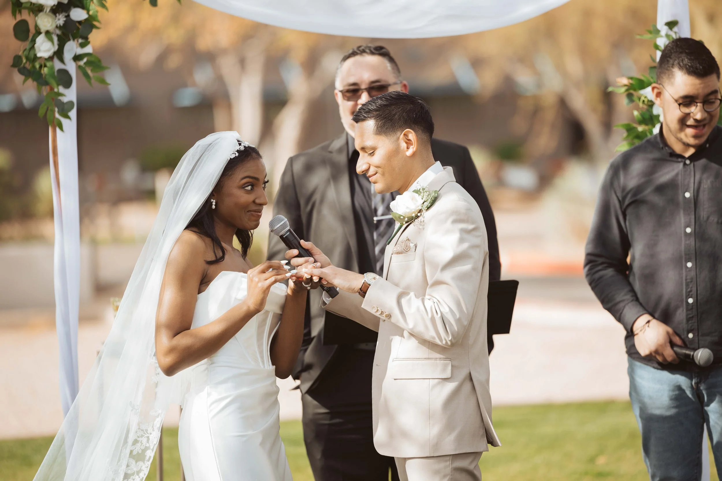 Wedding ring exchange at their home church in Gilbert Arizona