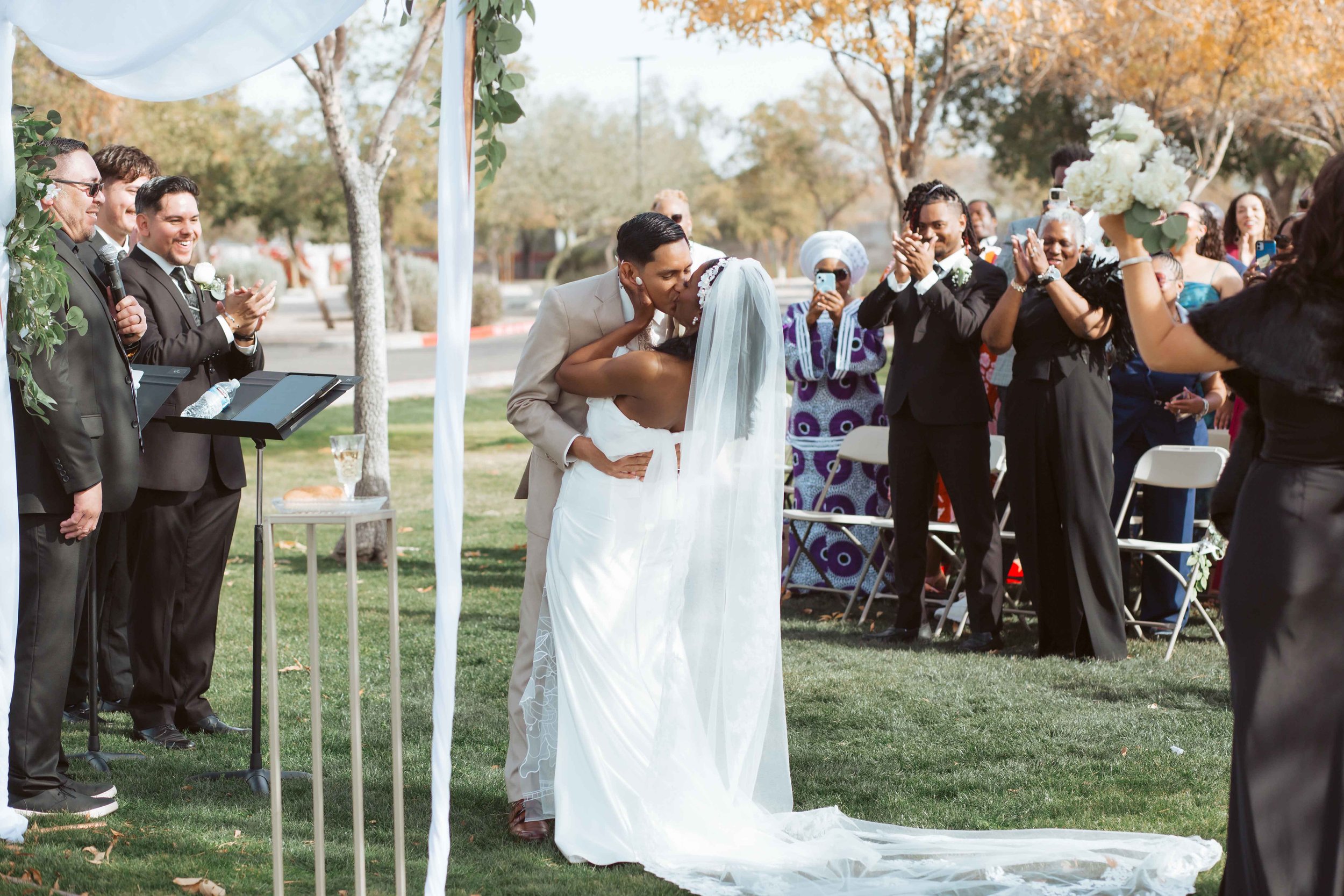 Wedding ceremony at Redemption Church in Gilbert surrounded by close friends and family