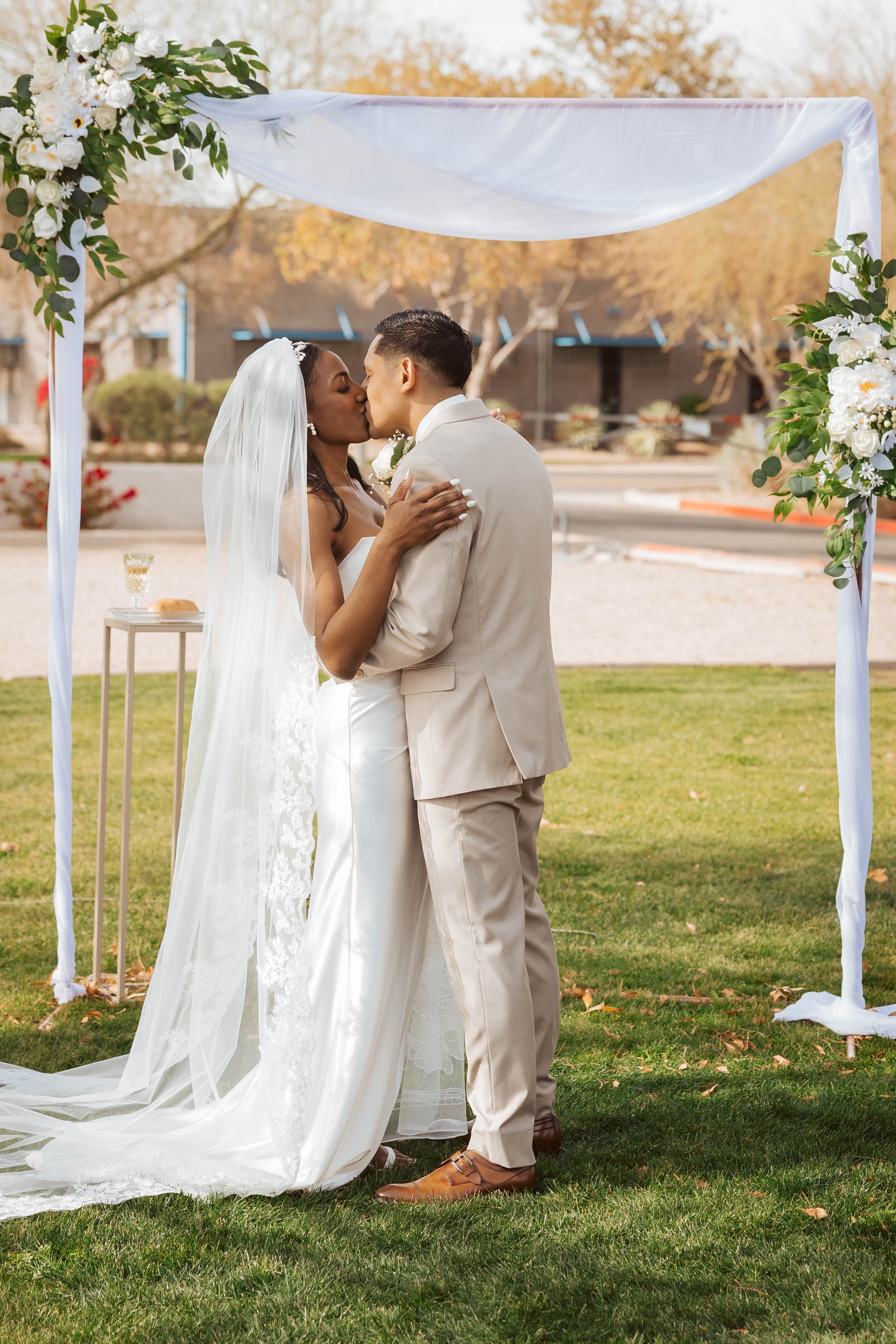 Kiss during wedding ceremony at Redemption Church in Gilbert 