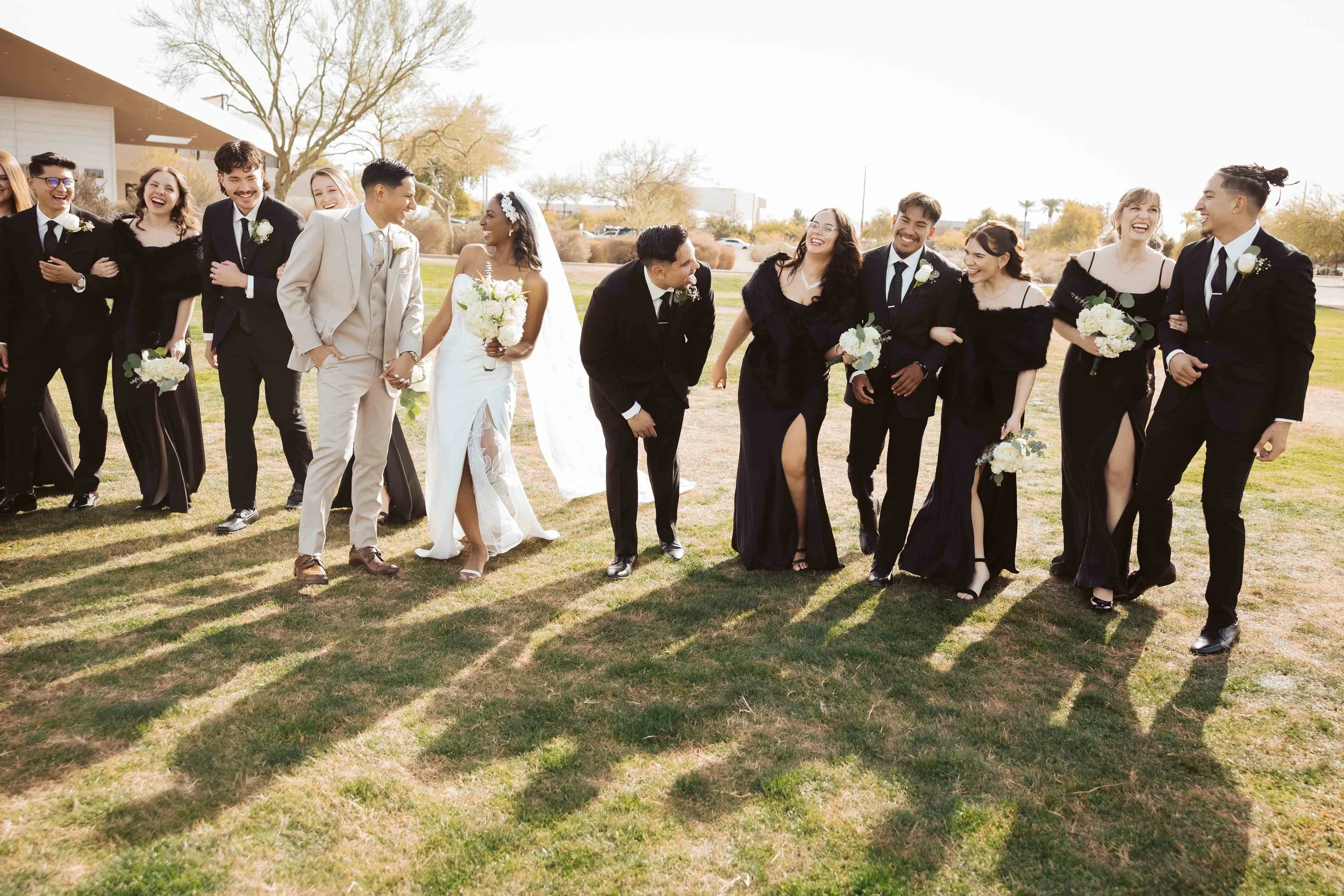Group wedding party portraits outside Redemption Church