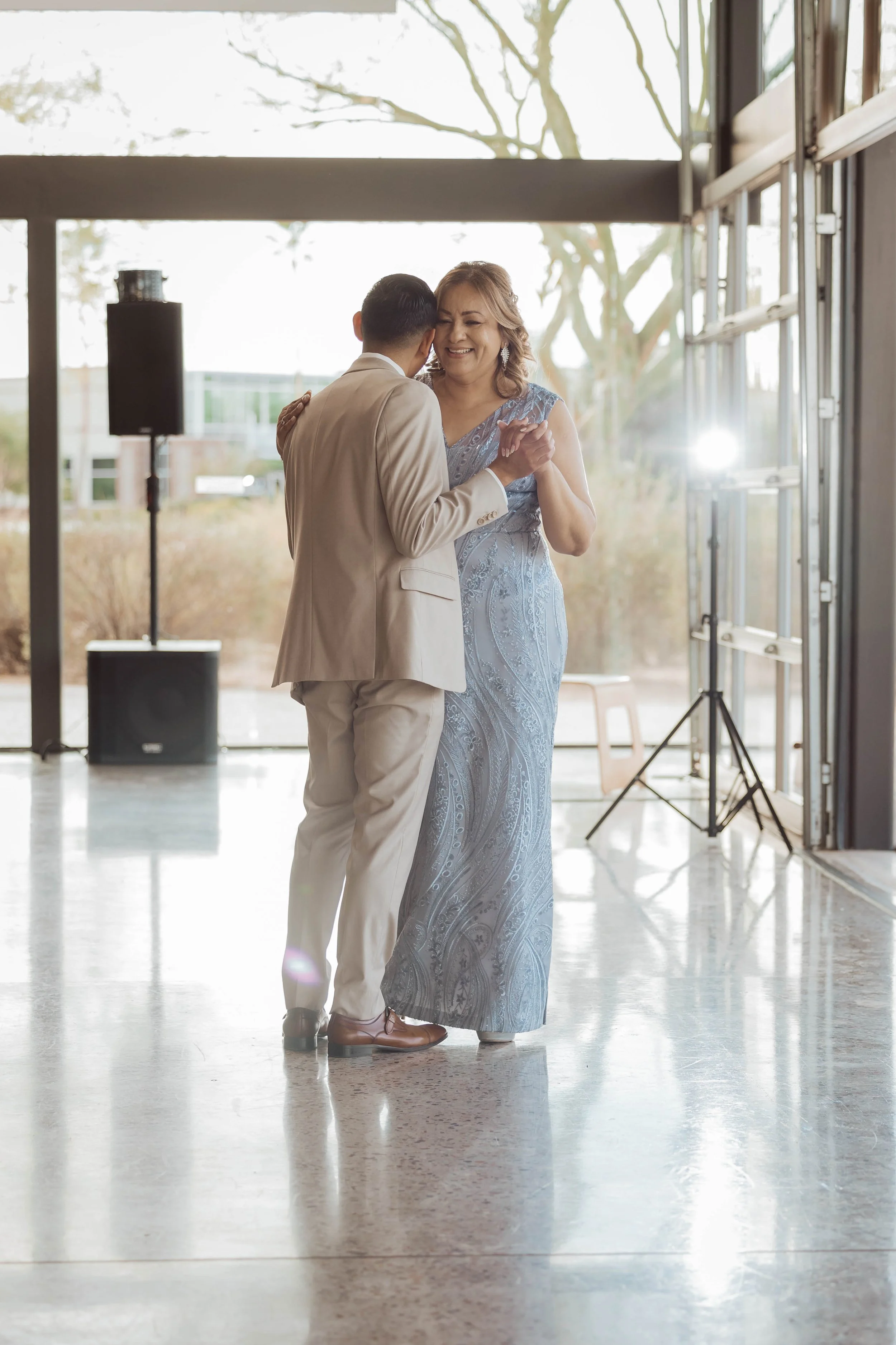 Groom dancing with his mom at Redemption Church reception