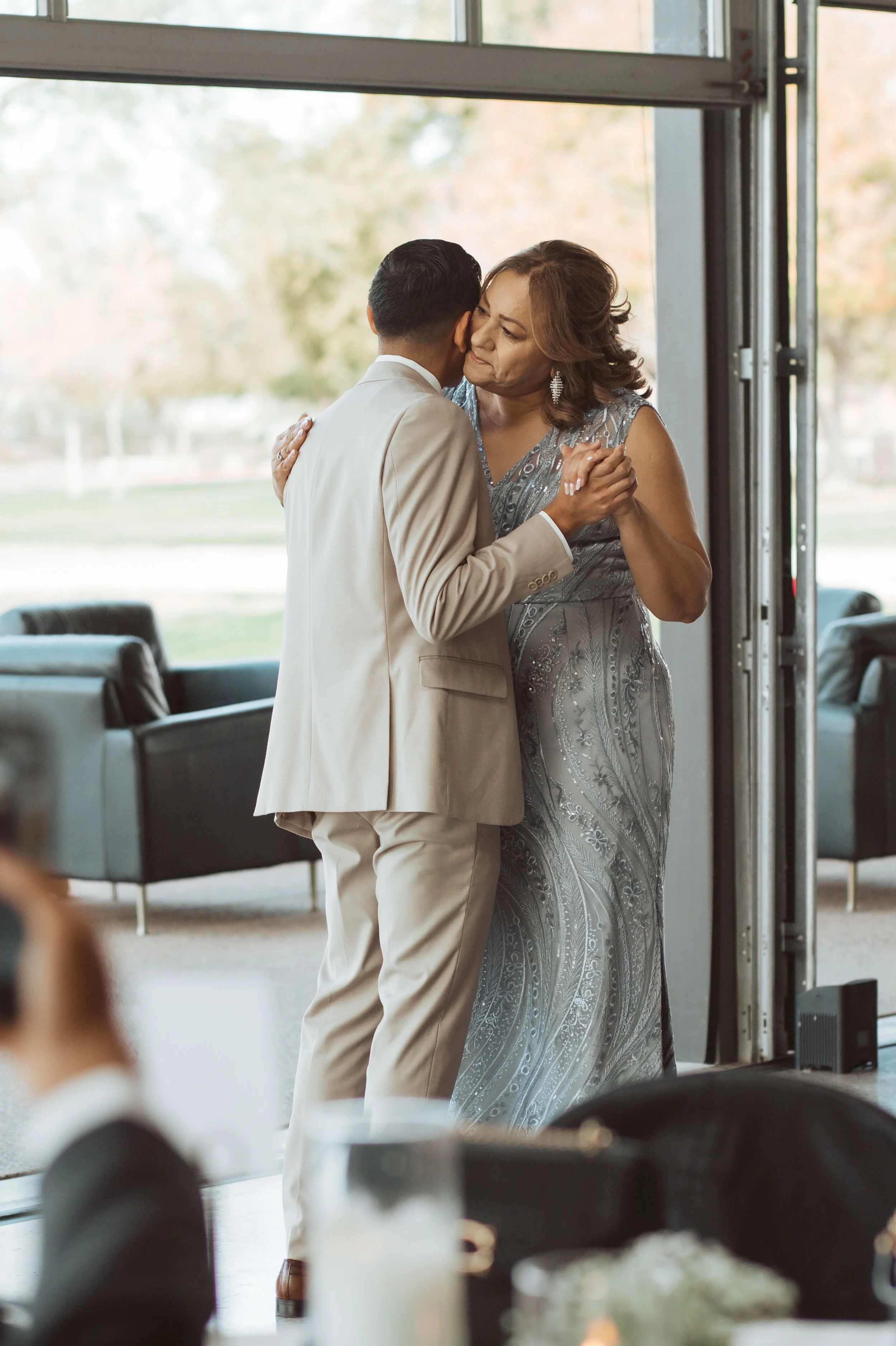 Groom dancing with his mom at wedding reception in Gilbert