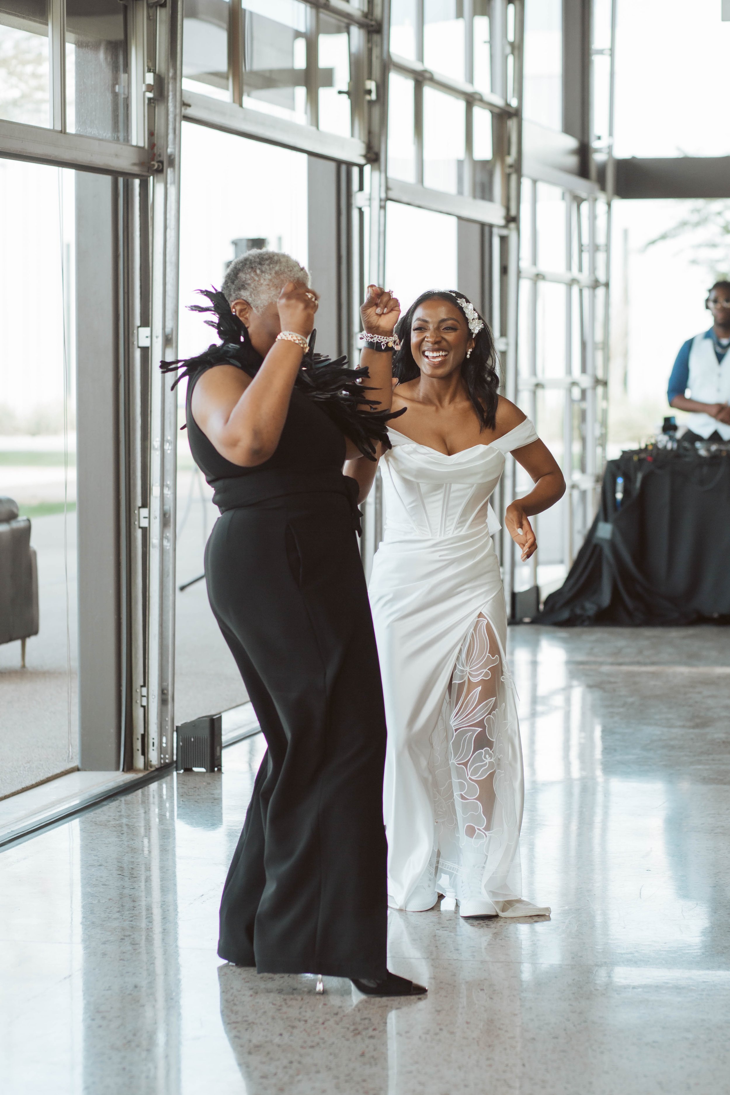 Bride dancing with her mom during the reception