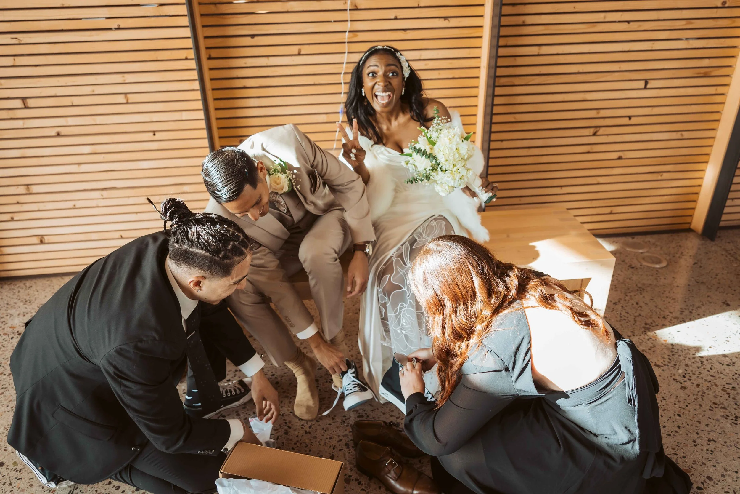 Jade and Abel capturing memories with every guest at their wedding reception