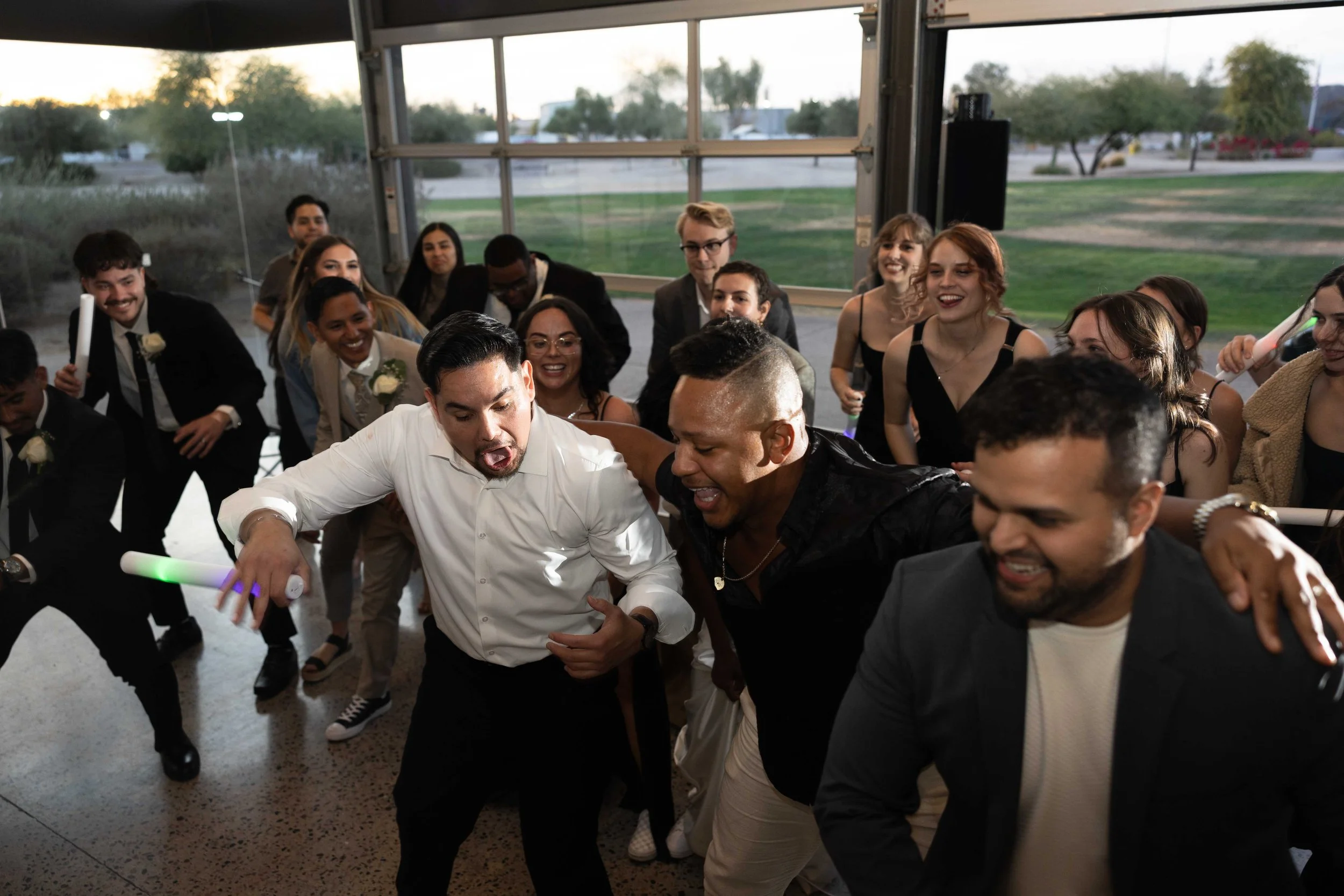 Guests dancing during a joyful wedding reception in Gilbert