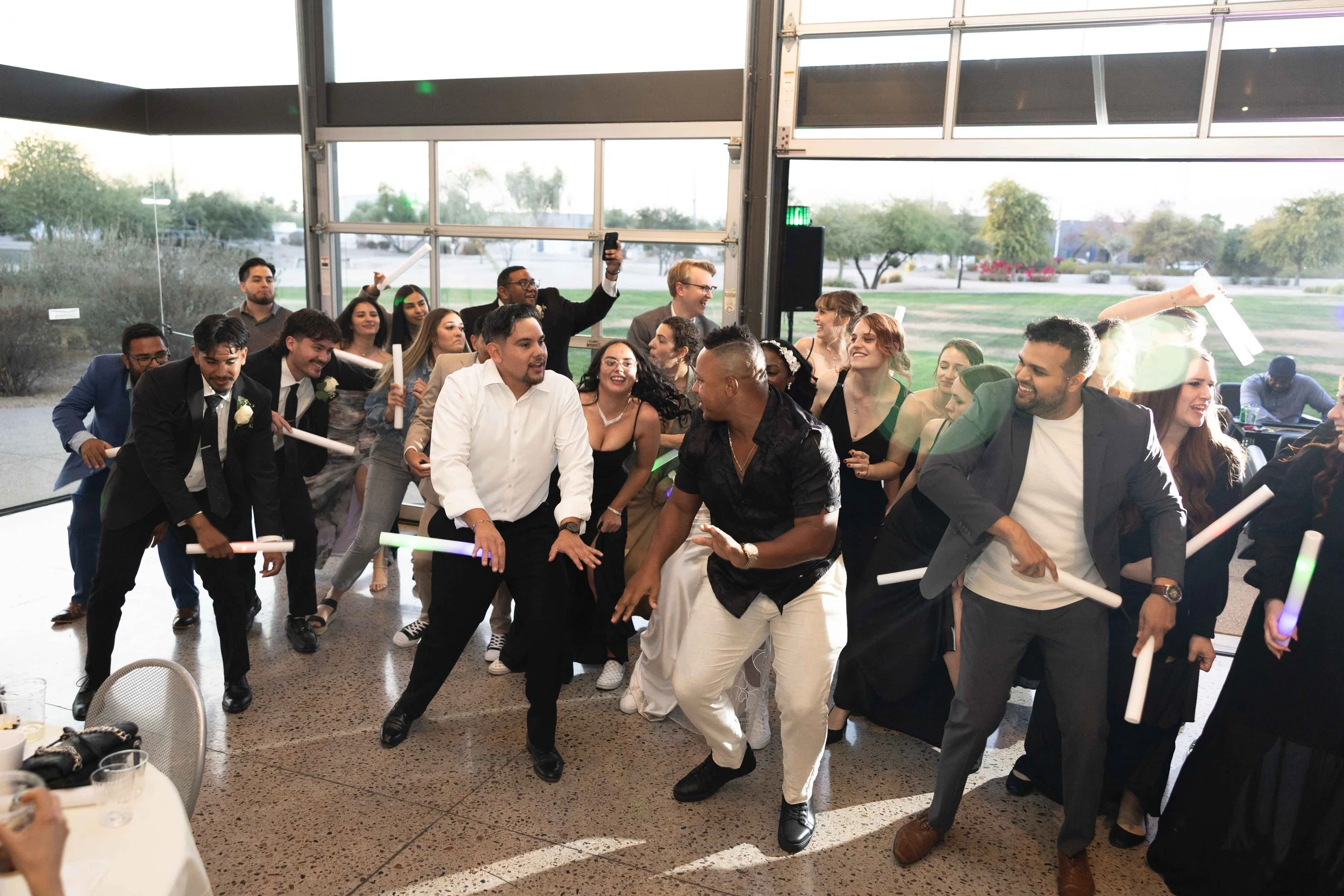 Guests dancing during a joyful wedding reception in Gilbert