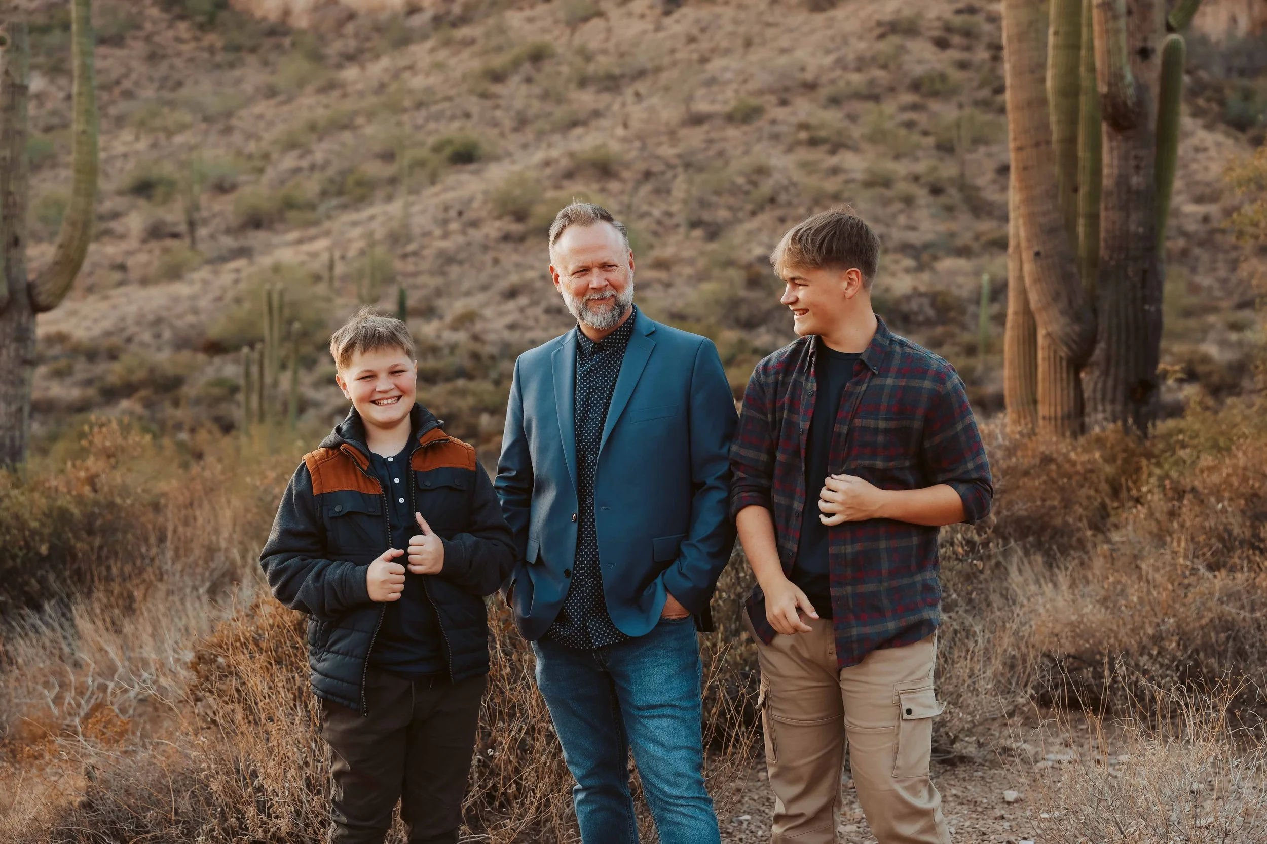 Two boys with their dad at Superstition Mountains family photo session