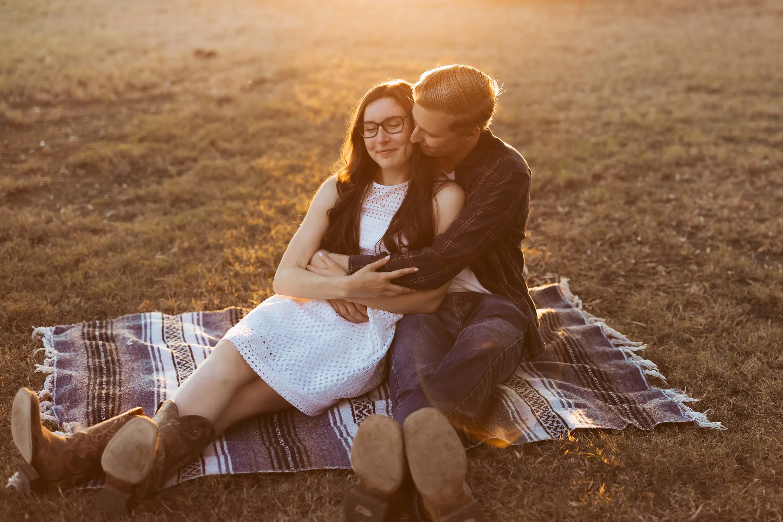 Romantic engagement portrait at Sahuaro Ranch Park in evening light