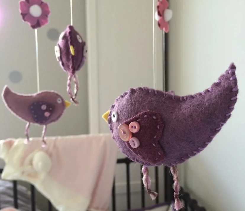 Handcrafted wood and felt bird mobile